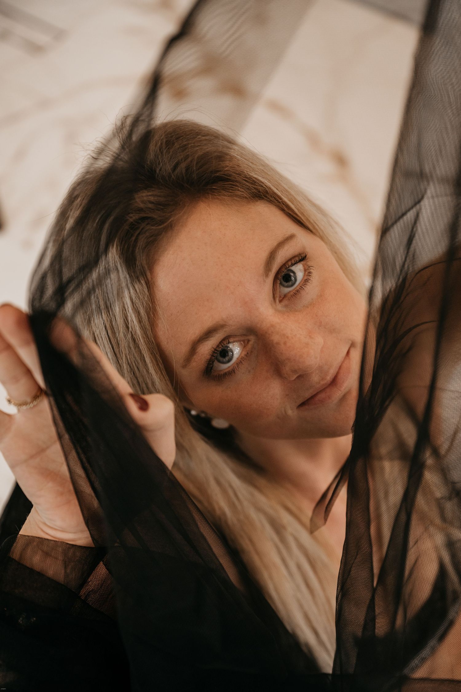 A series of artistic portraits showing expressive poses with dramatic lighting and shadows.