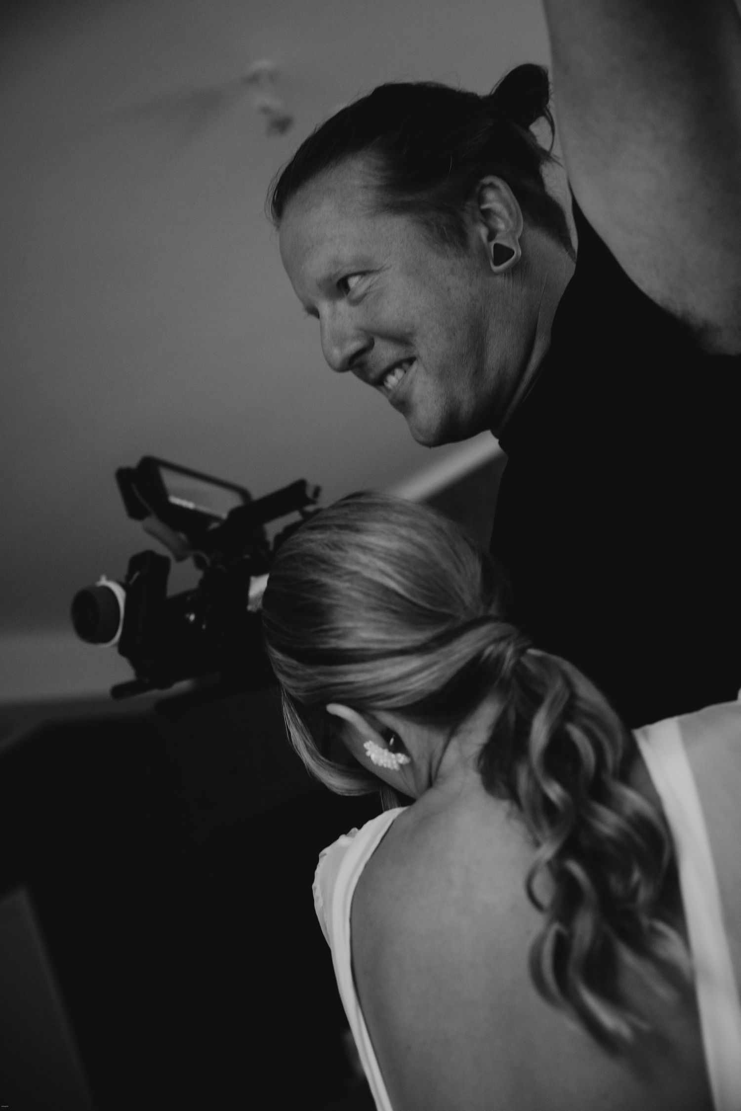 Intimate black and white portraits showing tender romantic moments between a couple.