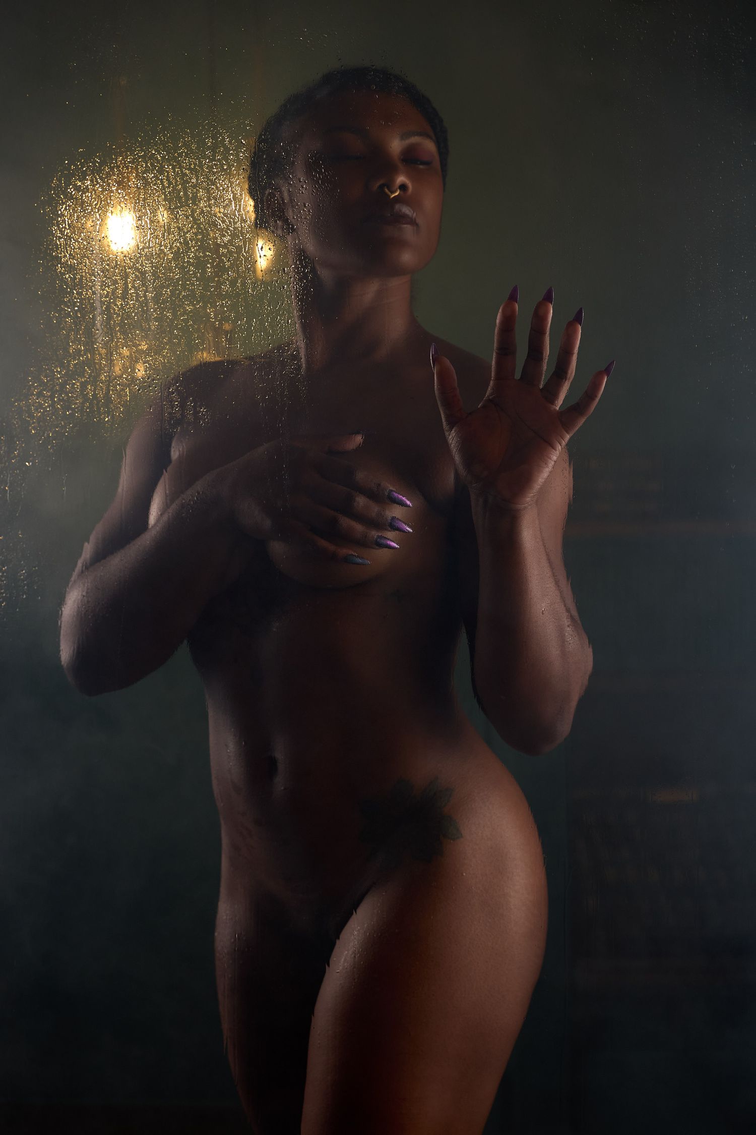 Luxury Charlotte boudoir portrait featuring elegant posing and high-end fashion-inspired studio lighting.