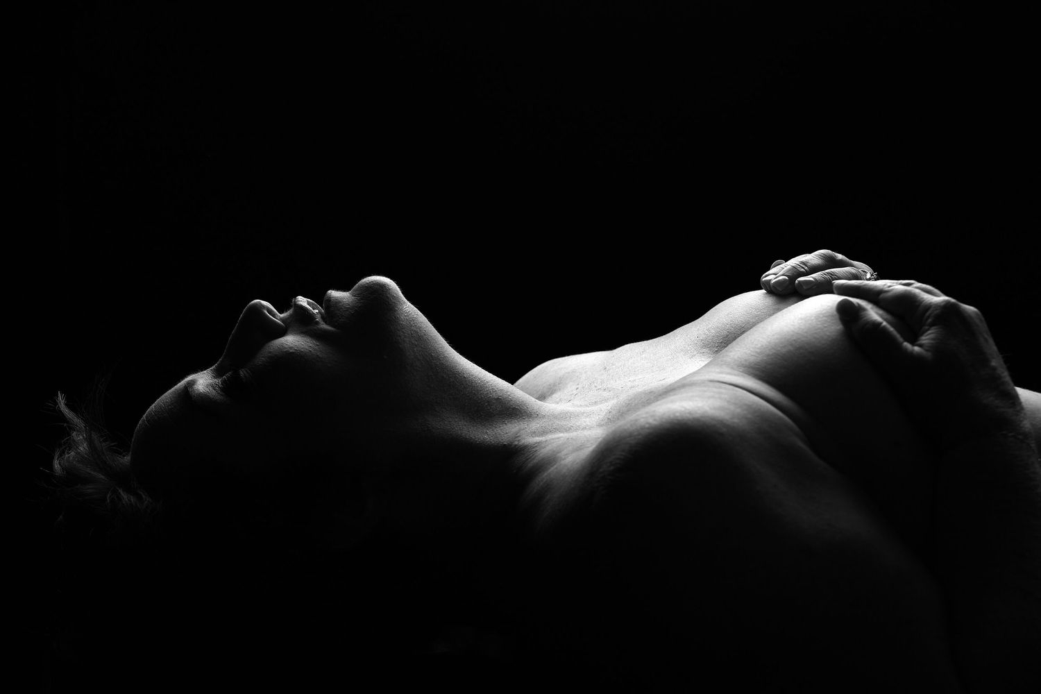 Body scape black-and-white boudoir photography in Charlotte NC studio.