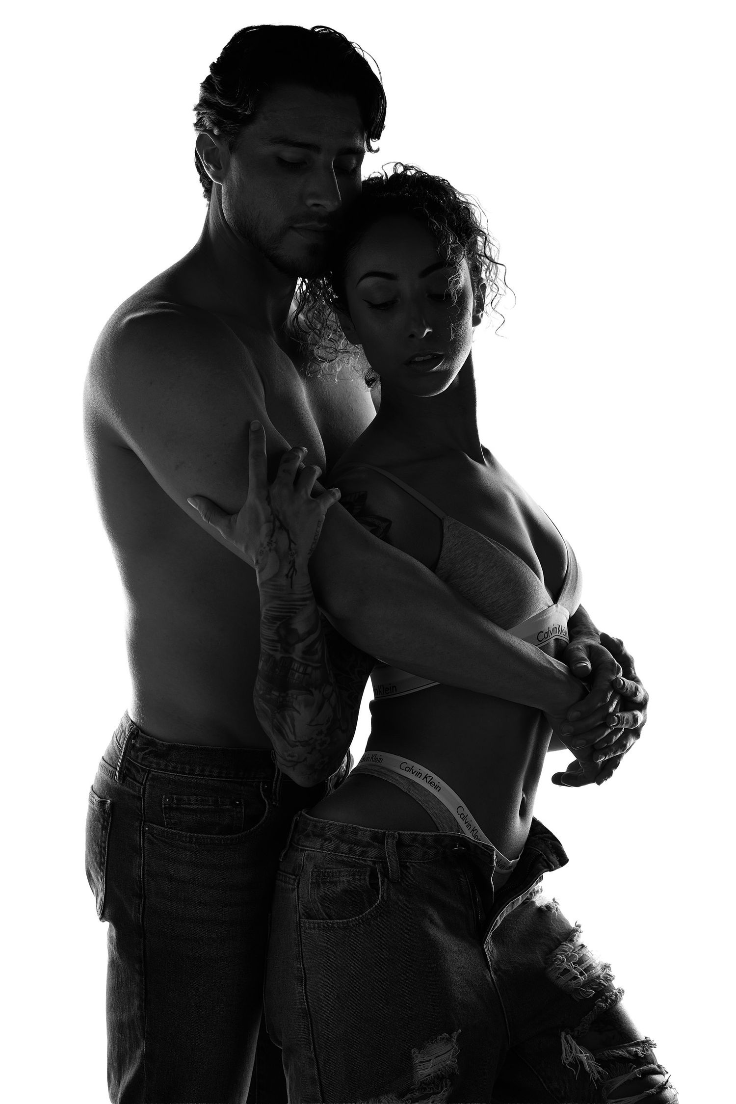 Professional boudoir posing and lighting for couples in Charlotte, NC.