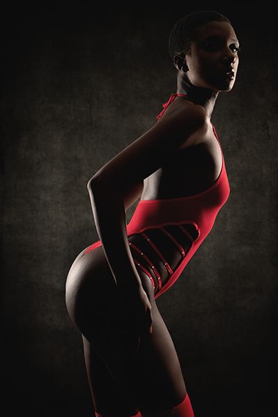Luxury Charlotte boudoir photography featuring editorial lighting and professional posing at IronVeil Boudoir studio.