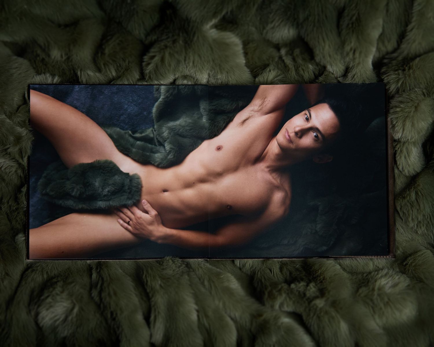 Hand-stitched leather journal-style boudoir album with fine art paper, a premium heirloom product for luxury photography sessions.