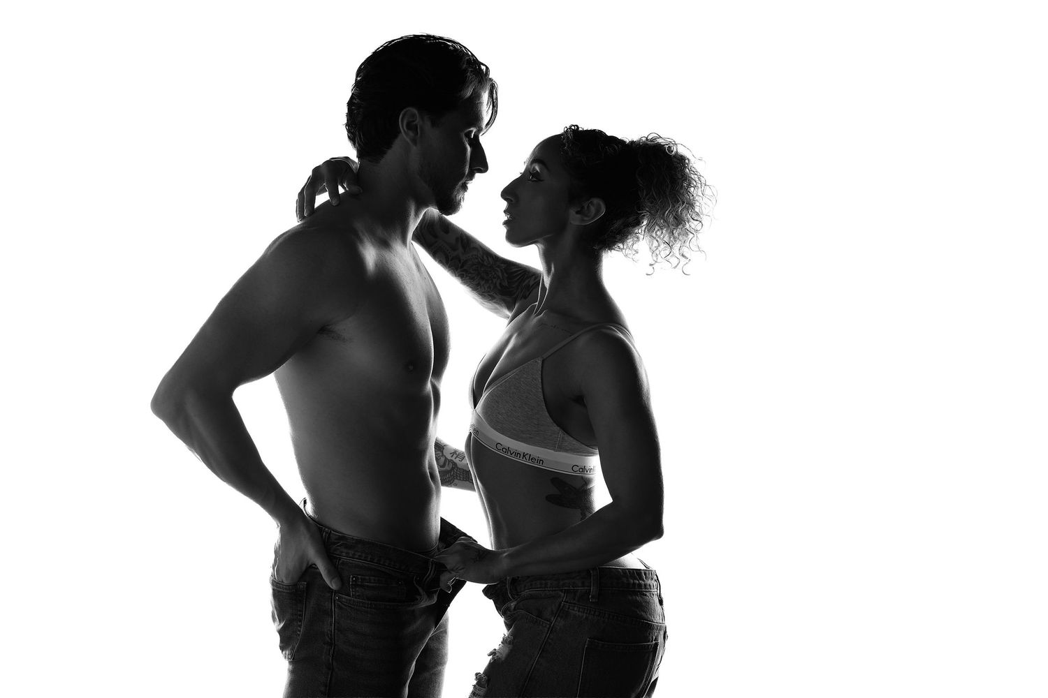 Luxury couples boudoir photography in Charlotte, NC, highlighting strength and body positivity.