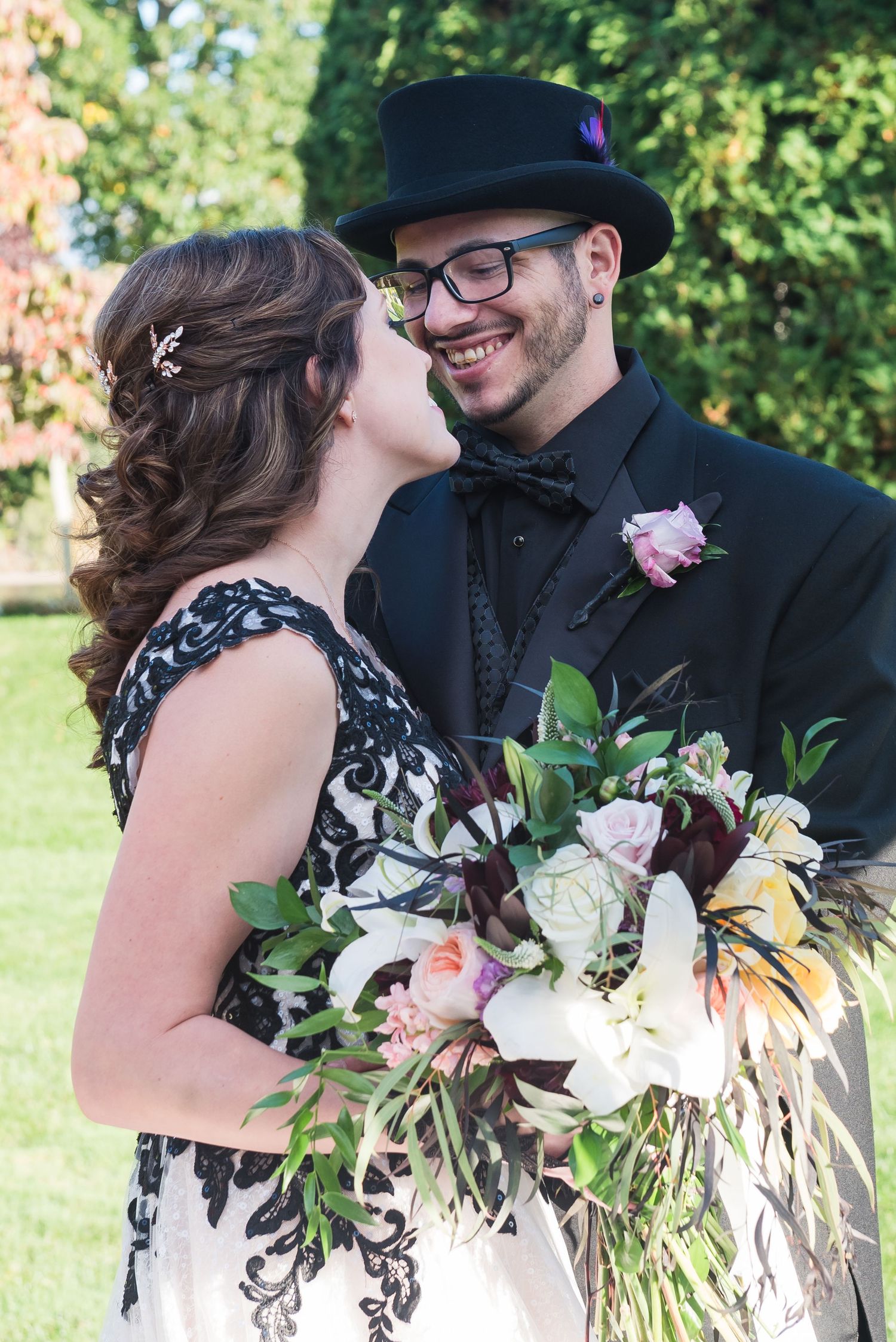 Romantic outdoor wedding photos with lush greenery and floral bouquet details.
