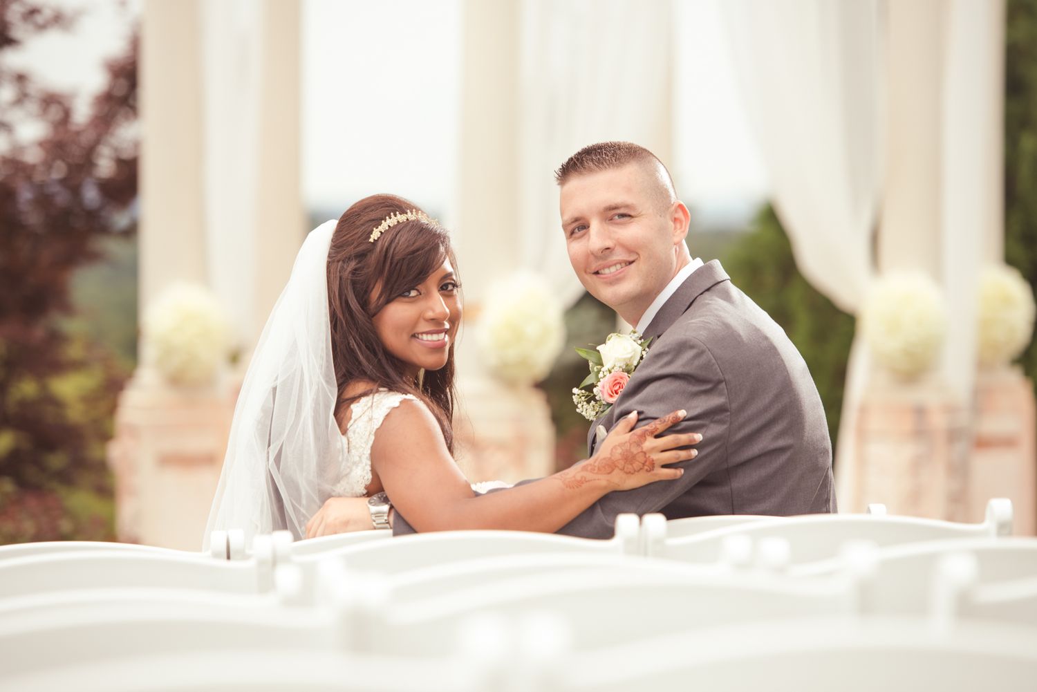 A series of romantic outdoor wedding photos showing a couple in formal attire embracing in natural settings.