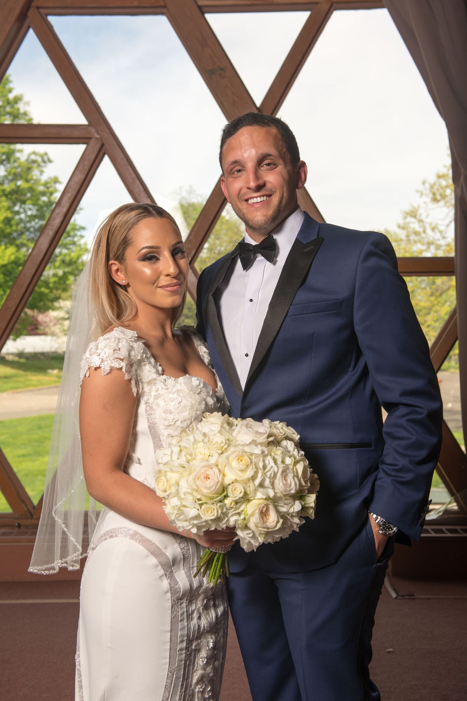 A series of elegant wedding portraits showing a couple in formal attire with white floral bouquet against a wooden backdrop.