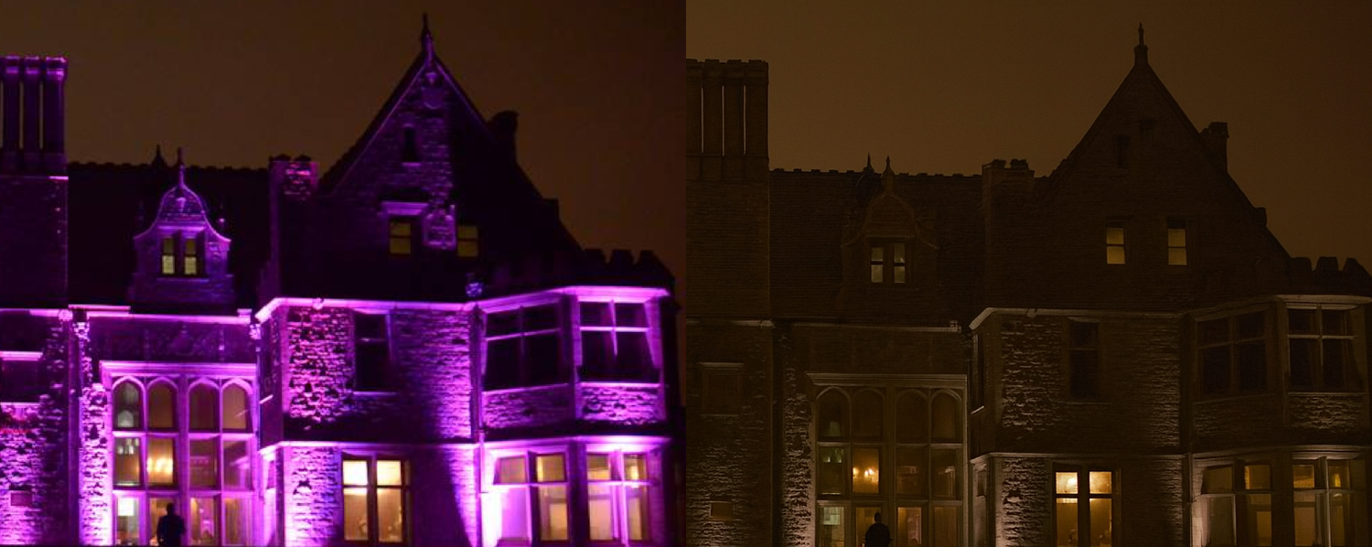 Gothic style building exterior illuminated with dramatic purple uplighting at night.