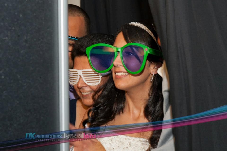 People wearing colorful shutter shades at a party celebration.