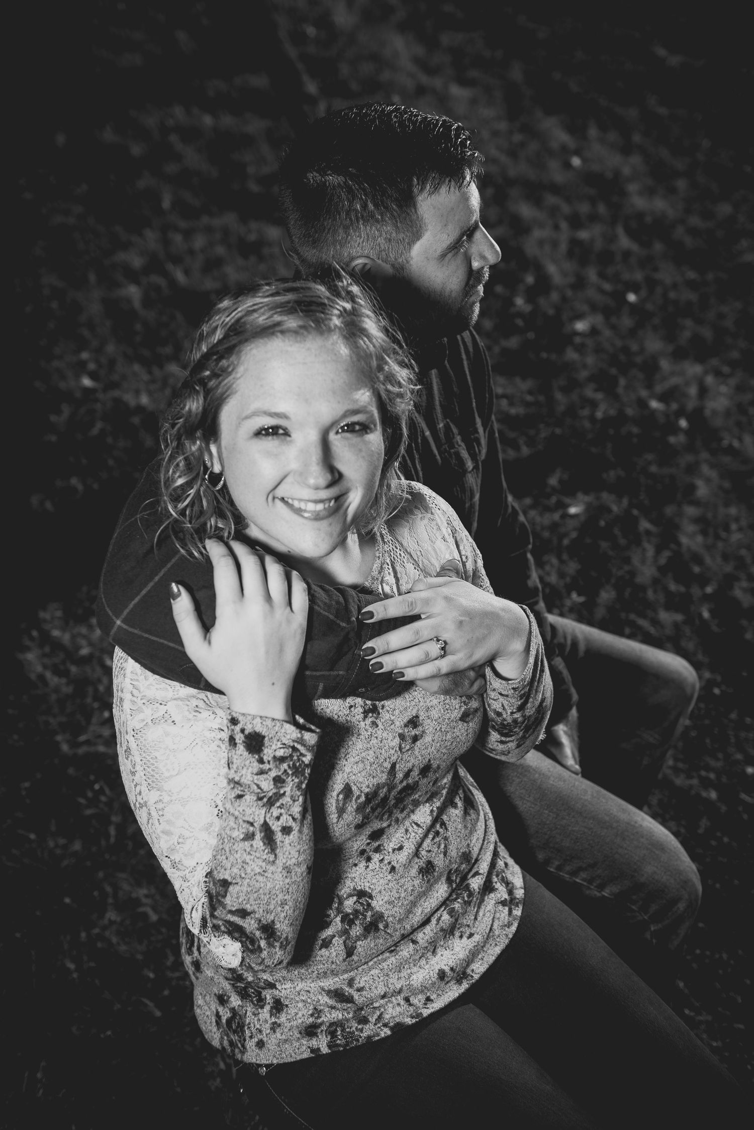 Artistic black and white portraits capturing tender moments between a couple.
