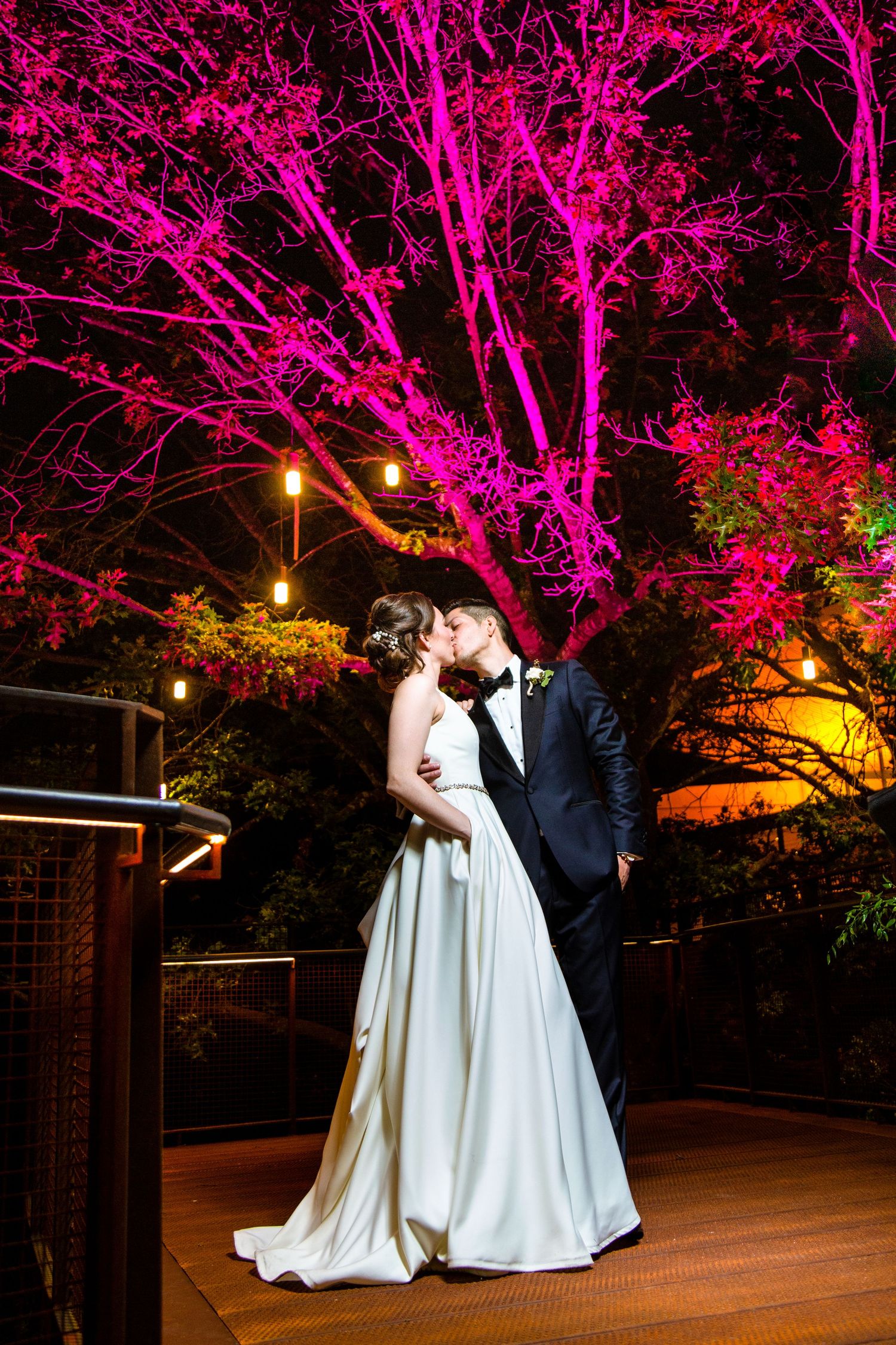 Grand finale night shot of a bride and groom at the San Antonio Botanical Garden photographed by Bella Priscilla Photography.