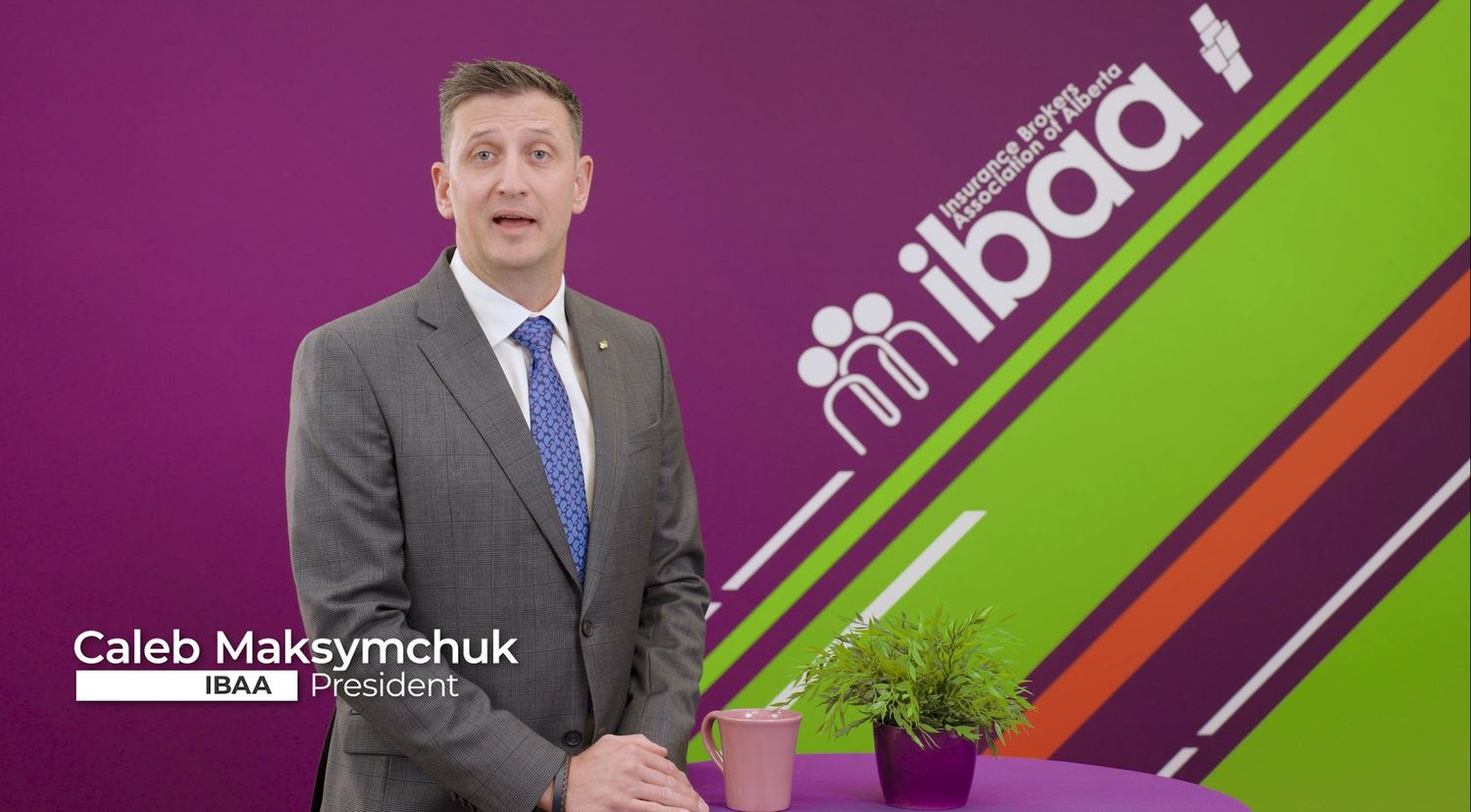 Host speaking on camera against purple and green branded background.