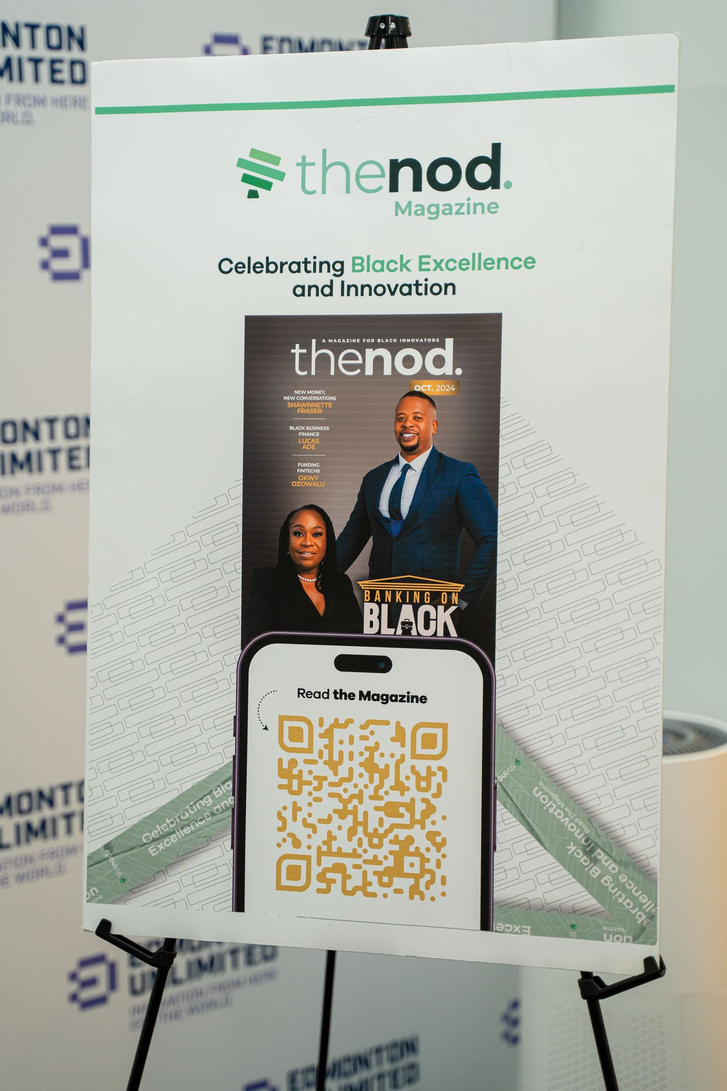 Display of 'The Nod' magazine covers and branding materials with QR codes.