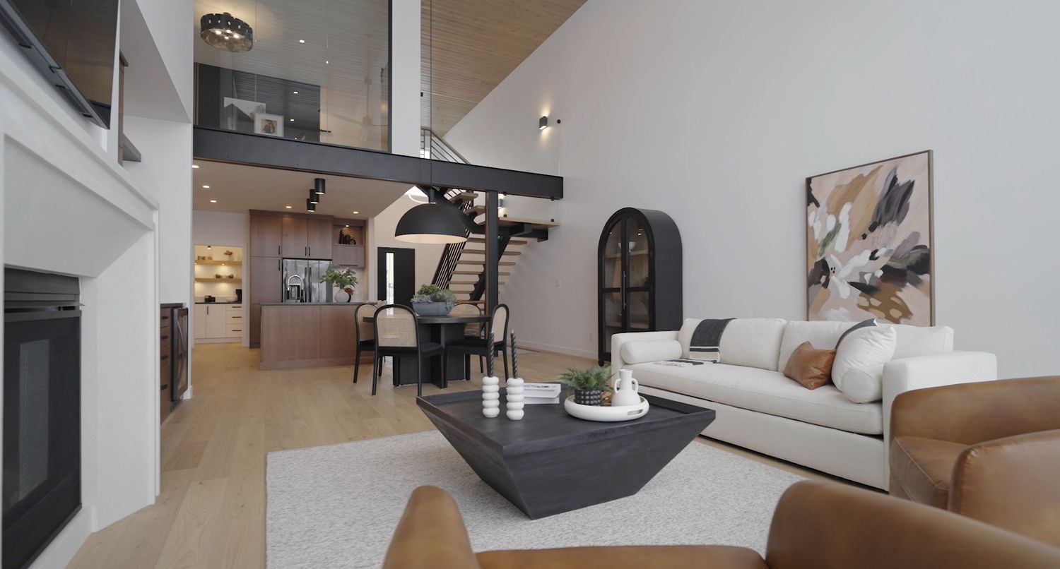 Modern office interior with sleek furniture and minimalist design featuring white walls and wooden accents.