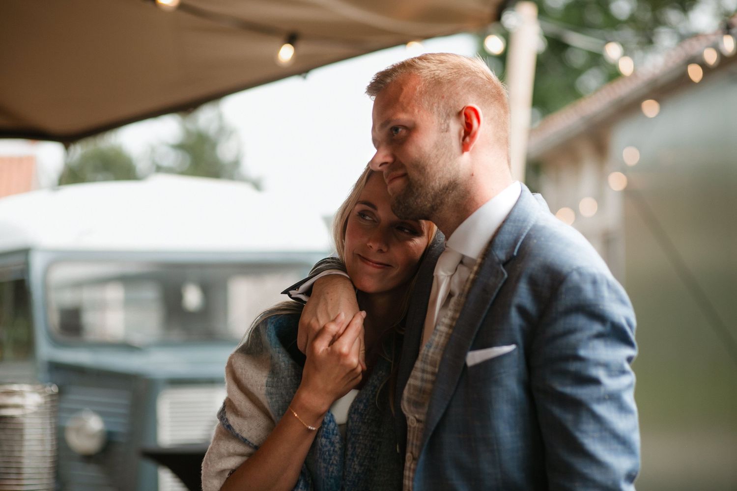 Emotional wedding moments captured in a series of candid photographs showing tender embraces and reactions.
