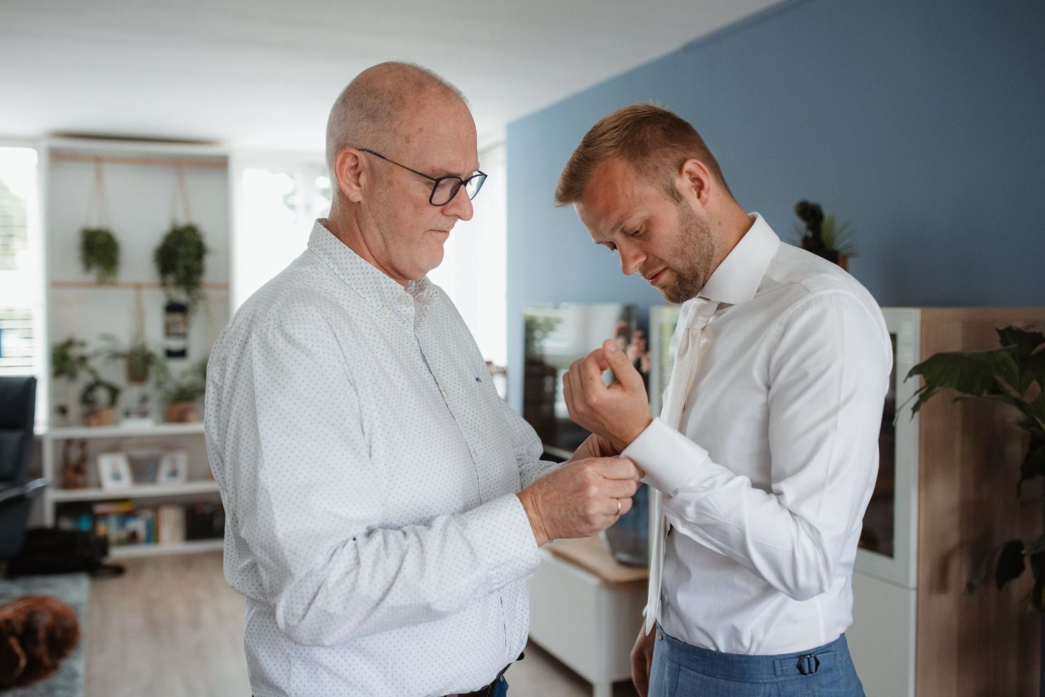 Heartfelt moments shared between family members during wedding preparations.
