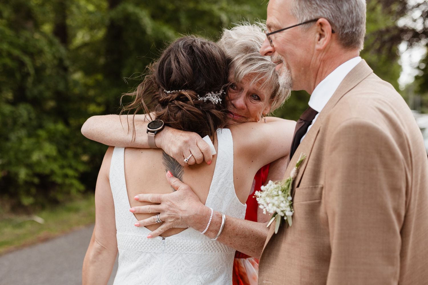 Romantic outdoor wedding portraits with soft natural lighting.
