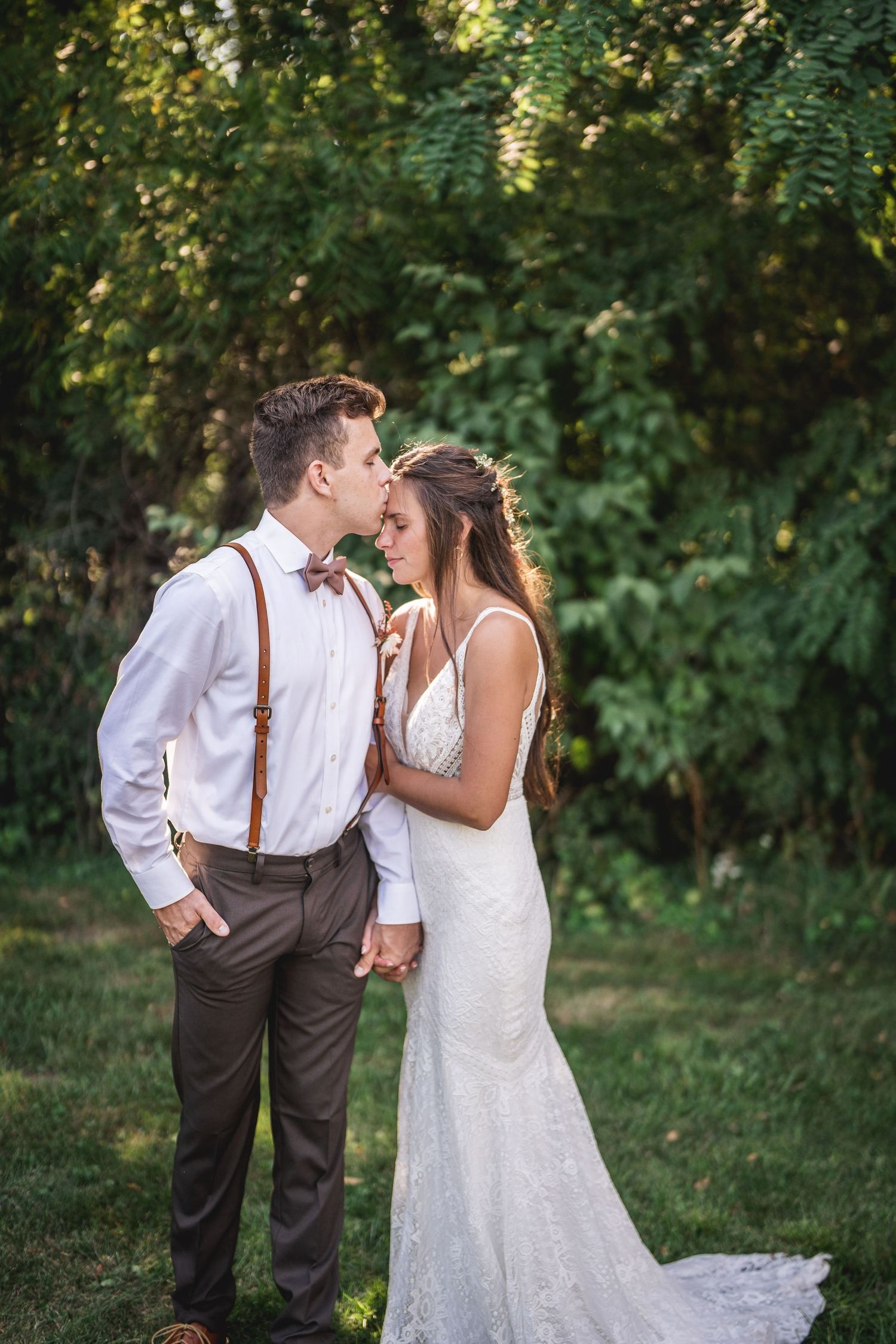 A series of romantic wedding portraits captured in a lush garden setting during golden hour.