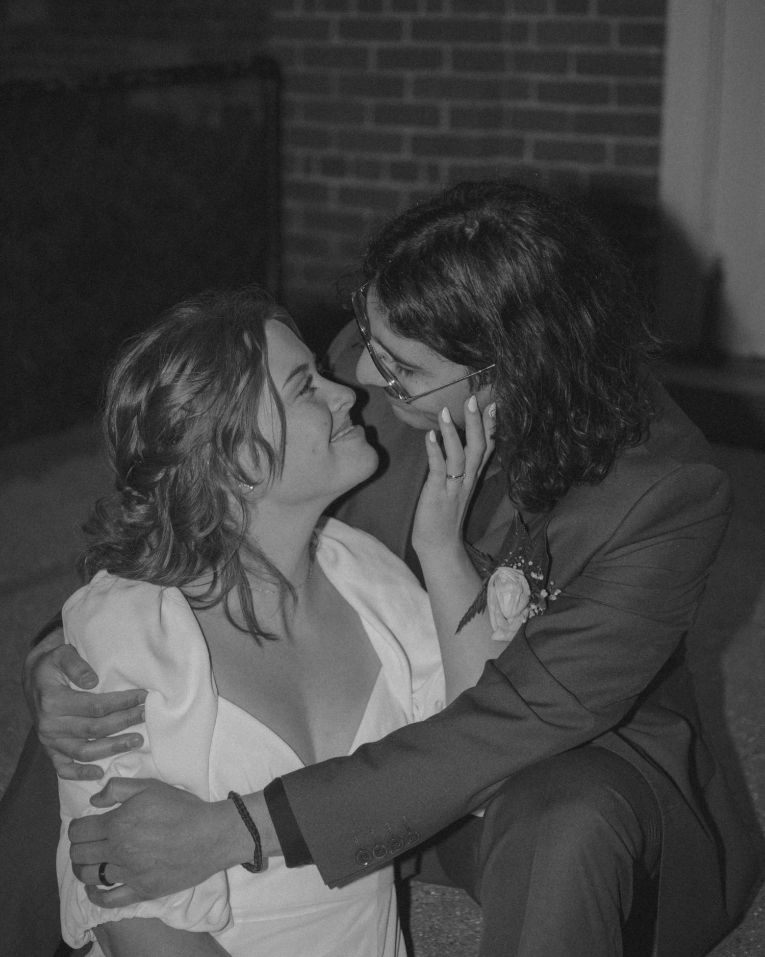 Black and white sequence showing tender moments between newlyweds.
