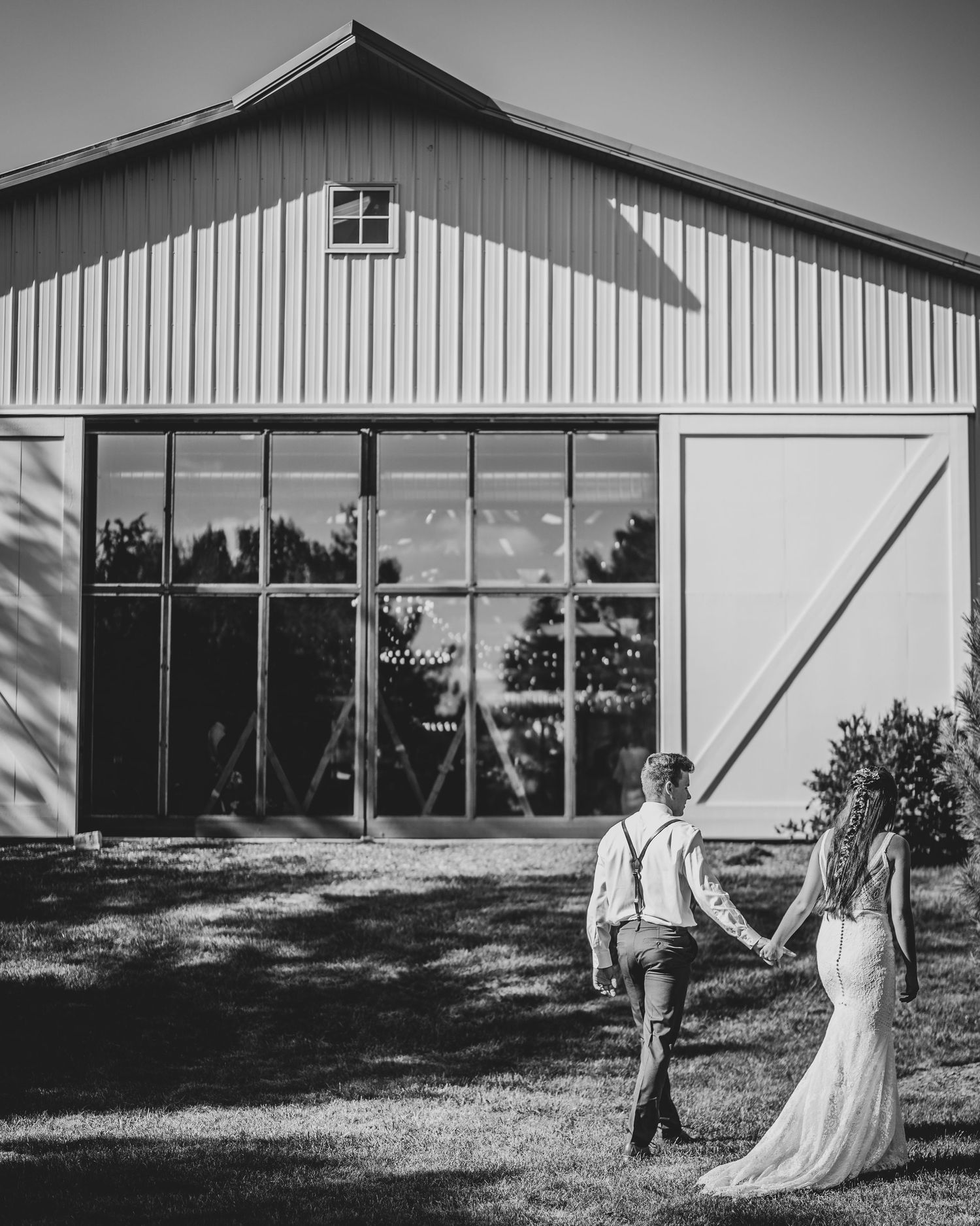Black and white photo sequence showing a couple posing with lightsabers outside a rustic building.