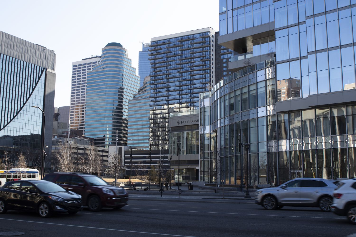 Present day “Bridge Square”, aka the Gateway District of Minneapolis, the crossing of Hennepin Ave, Washington Ave, and Nicollet Mall. Now, this land is lined with parking garages and skyscrapers, paved with asphalt, with little of its former natural beauty aside from the preserved Gateway Park, a small patch of green amongst the ocean of stiff structures.