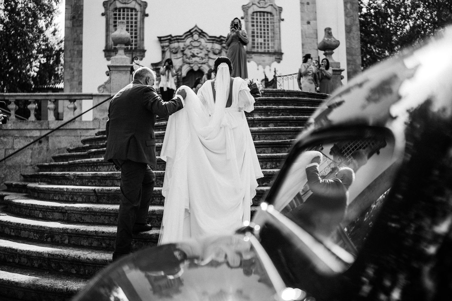 Elegant wedding ceremony setting with stone architecture and ornate details in classic style.