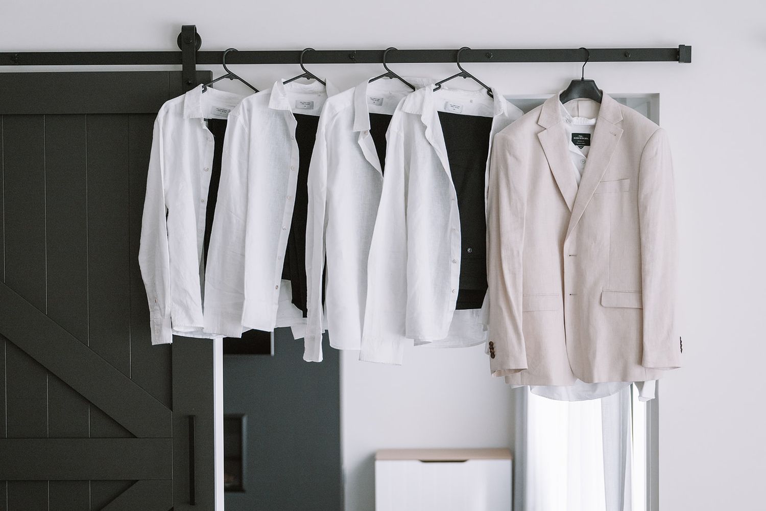 Groomsmen suits hanging