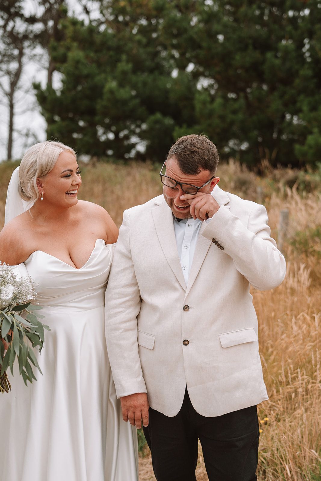 Groom crying first look wedding