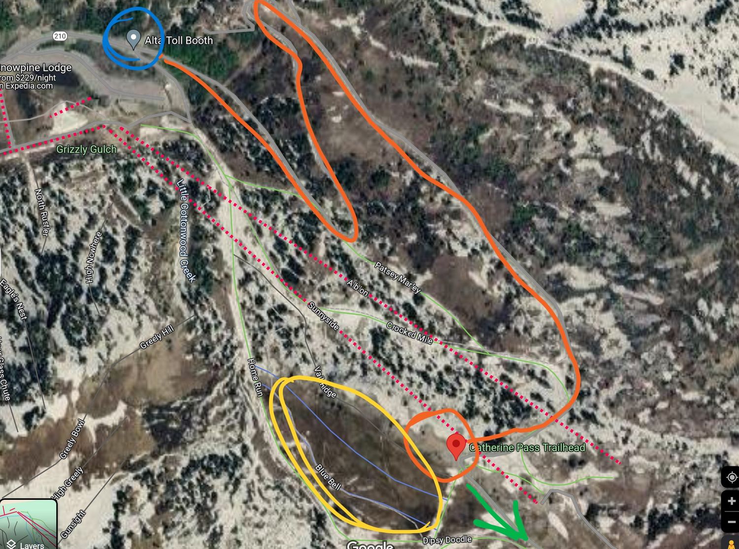 Aerial satellite map view of a mountain terrain with orange and yellow highlighted trail routes marked on snowy landscape.