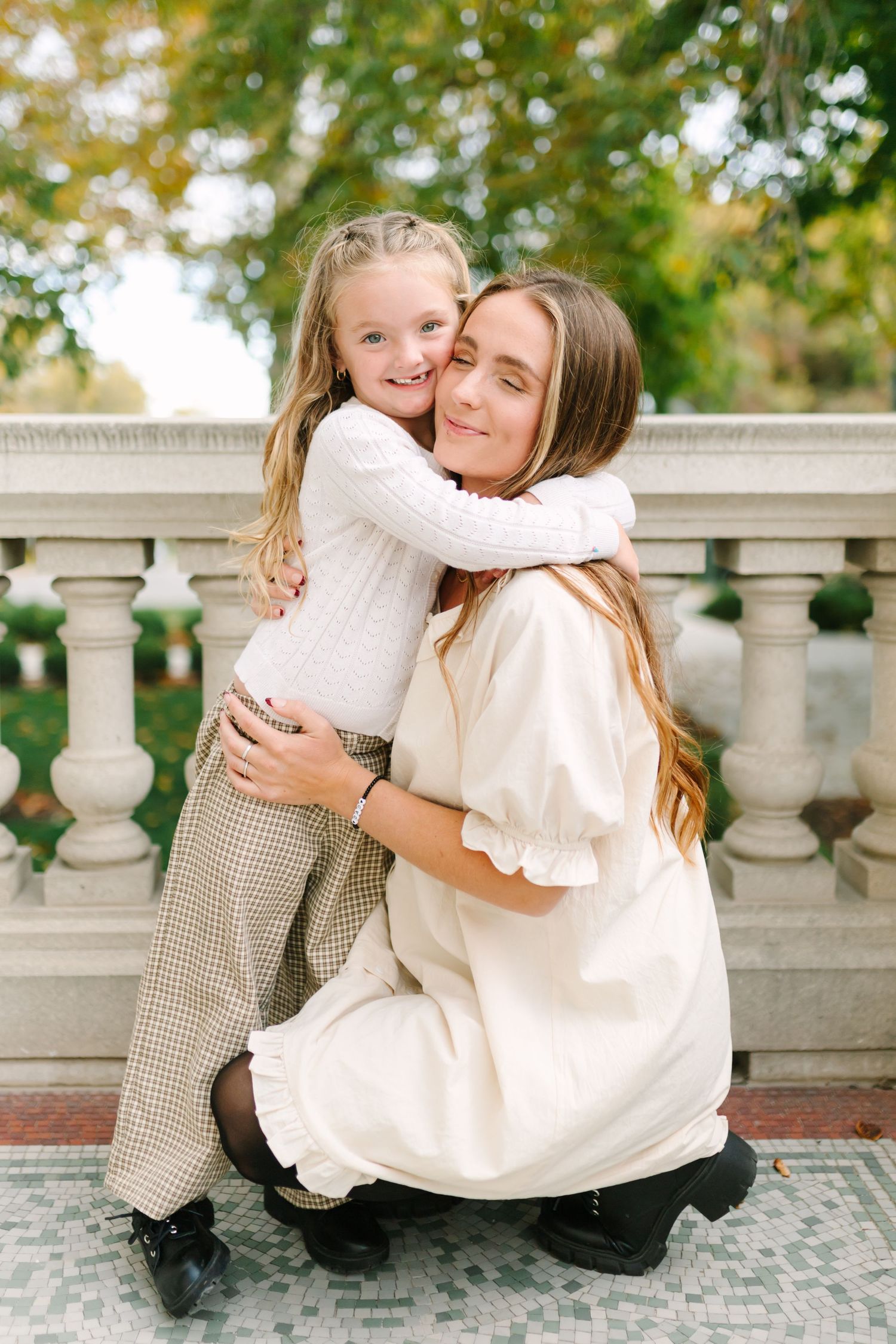 Sweet outdoor portrait session featuring warm embraces and laughter in Salt Lake City, Utah.