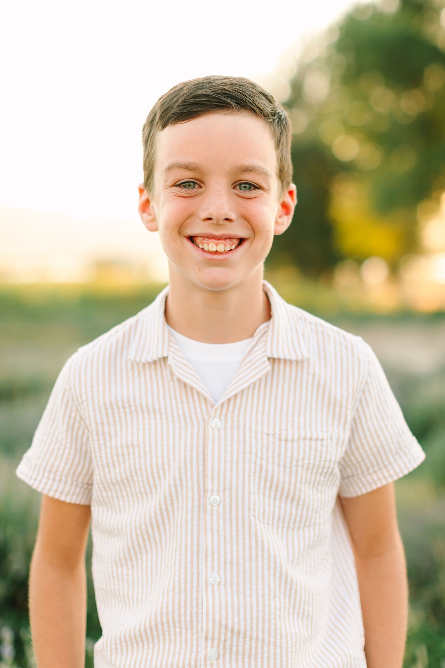 A series of photos showing a child in a white striped shirt against a soft outdoor background.