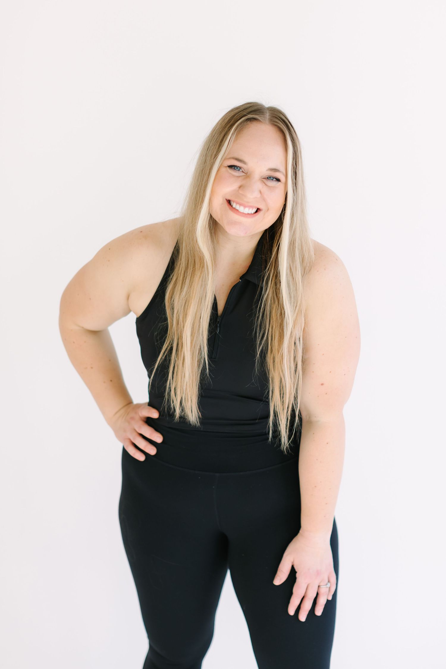 Person wearing all black athletic wear poses in three different casual stances against white background.