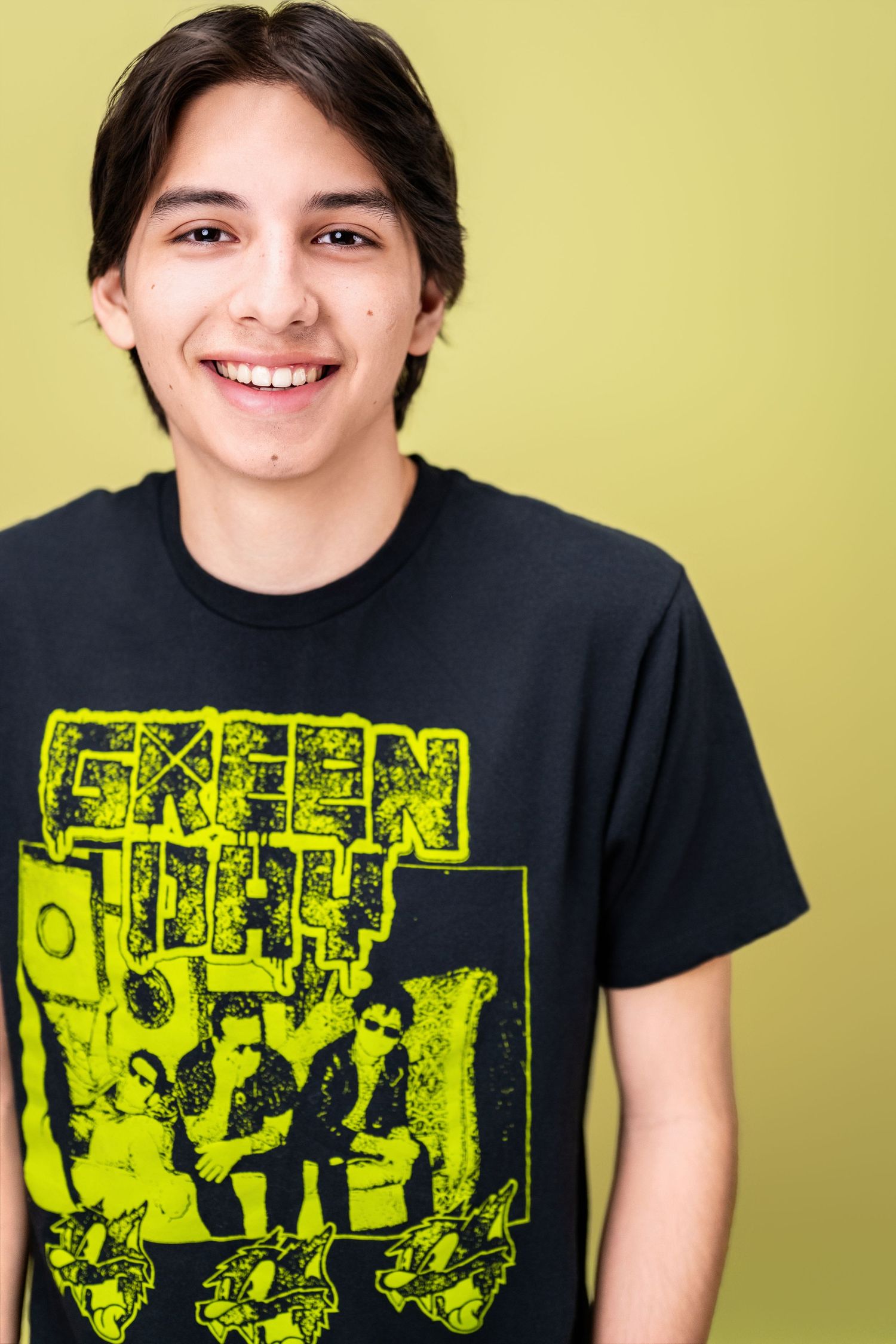 College audition headshot of a Musical Theatre student with a relaxed smile and expressive personal style in Los Angeles.