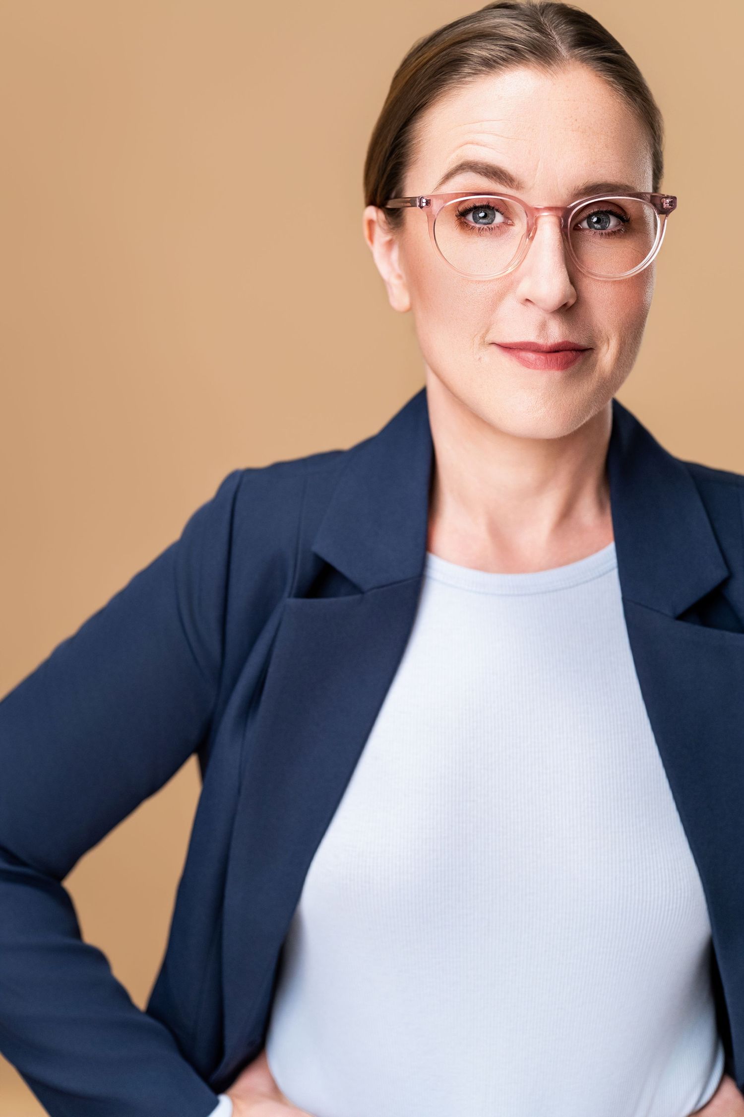 Actor headshot in Los Angeles with a specific expression, showing how acting through a session can create a more castable headshot.