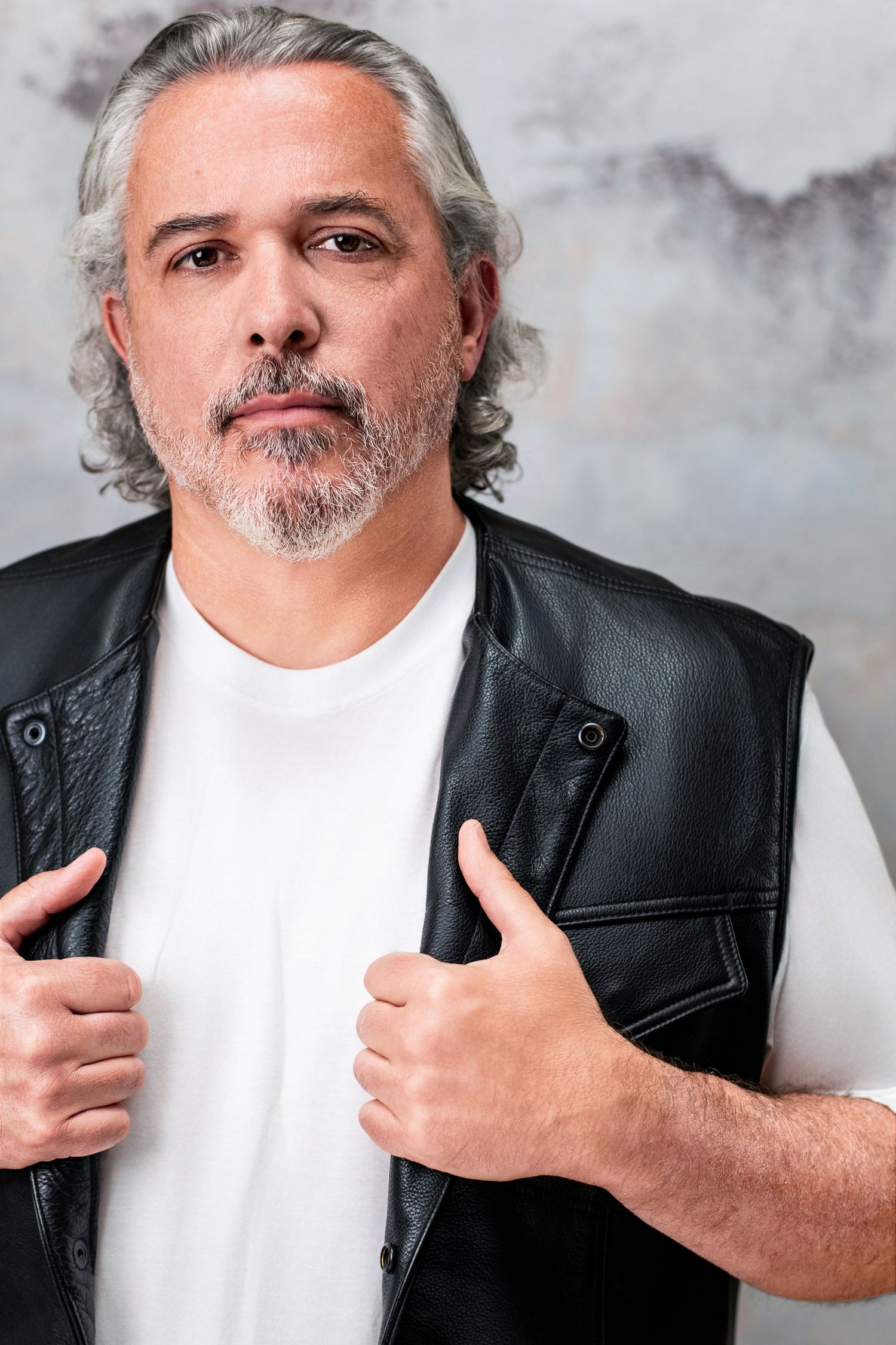 Actor headshot with a serious, grounded expression suited for theatrical roles in Los Angeles