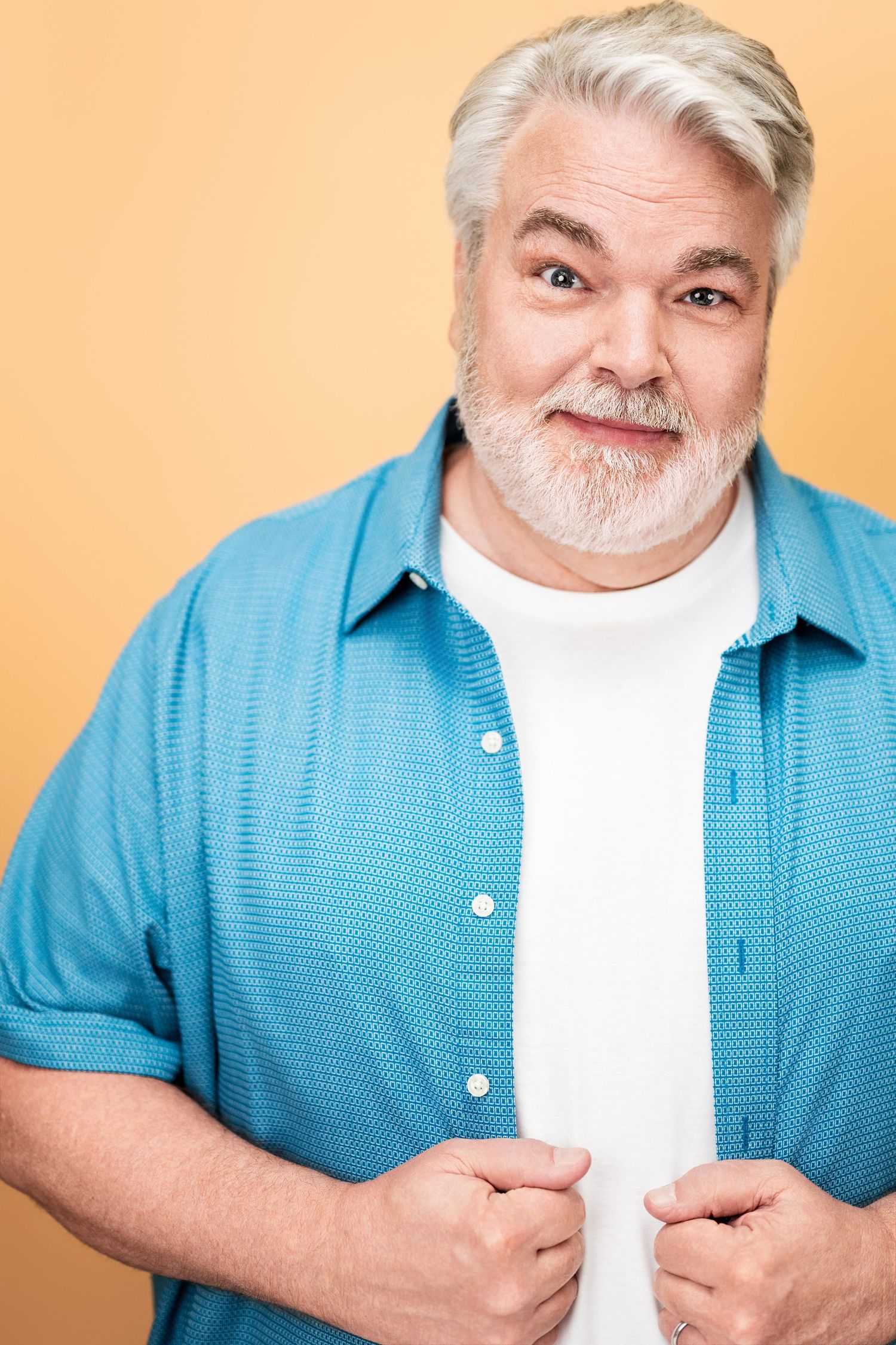 Expressive older male actor headshot with natural expression on a neutral background in Los Angeles