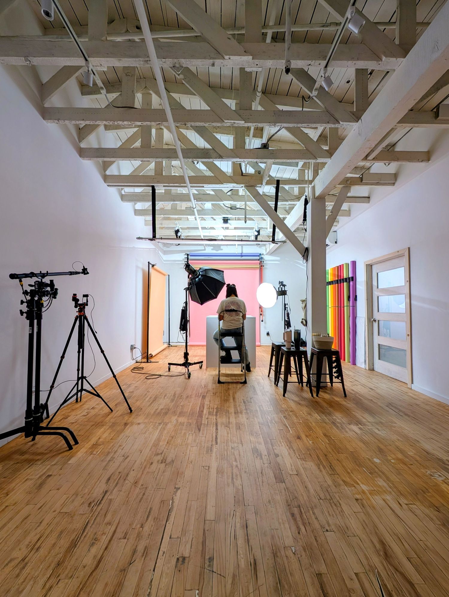 Nice Headshots studio in downtown Los Angeles showing professional lighting, colorful backdrops, and the main headshot shooting area.