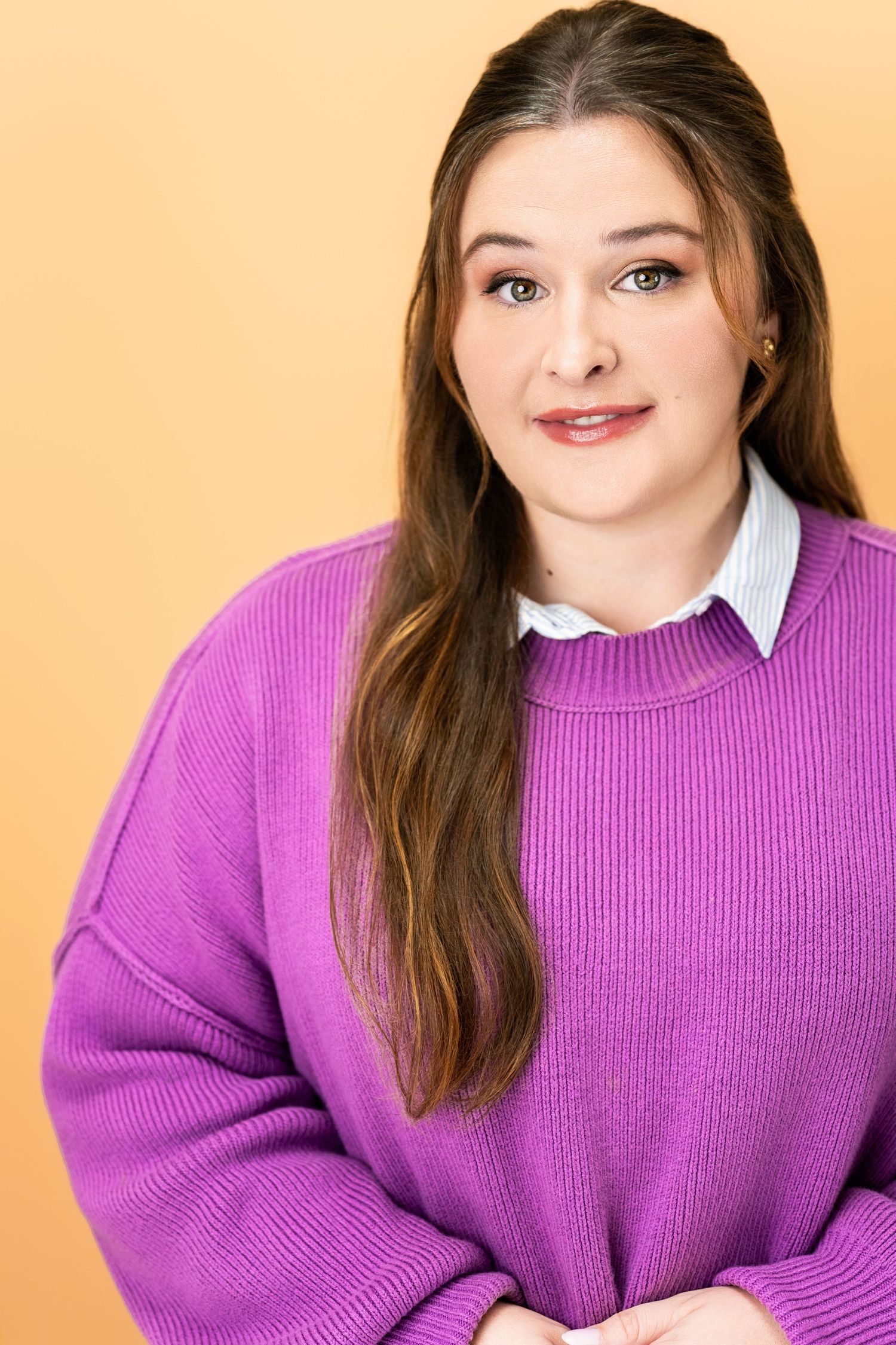 Actor headshot featuring a subtle expression on a neutral background in Los Angeles