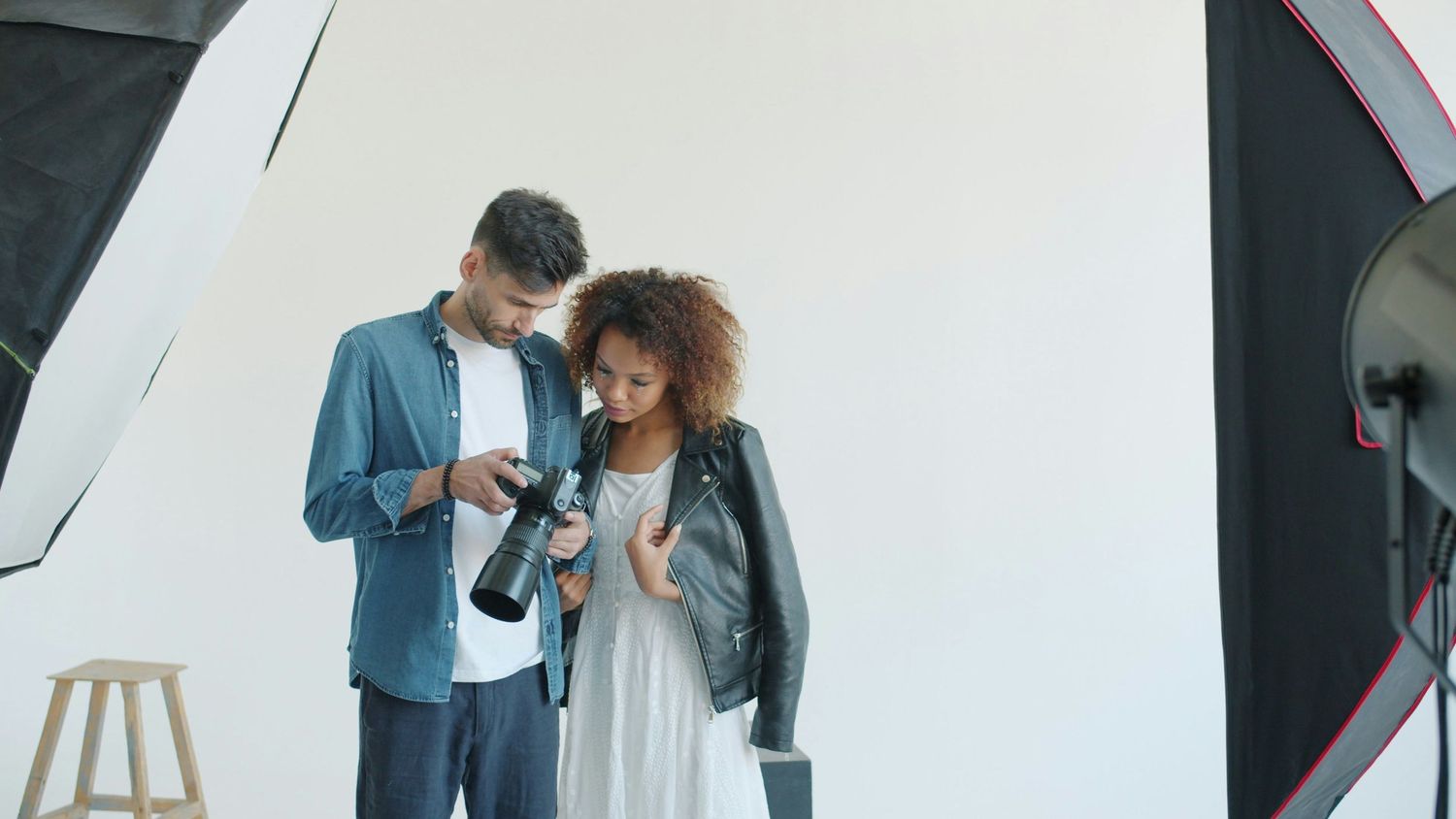 Actor and photographer reviewing images during a professional headshot session