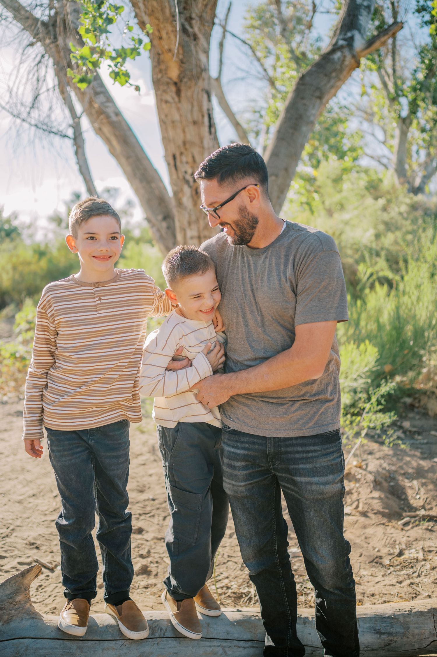 Luxury Gilbert Arizona family photography surrounded by lush greenery. A relaxed, stress-free experience that captures real connection.