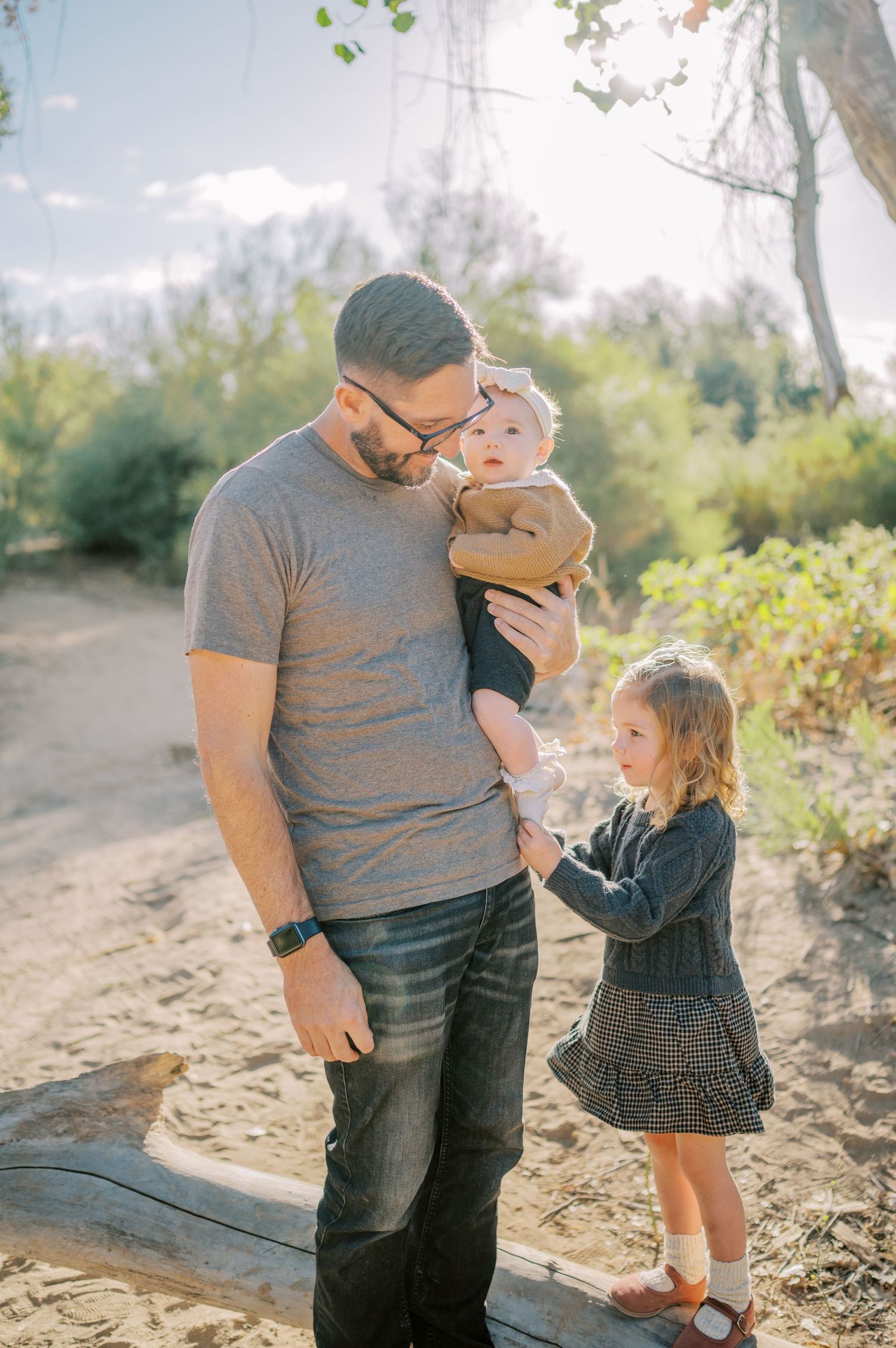 Luxury Gilbert Arizona family photography surrounded by lush greenery. A relaxed, stress-free experience that captures real connection.