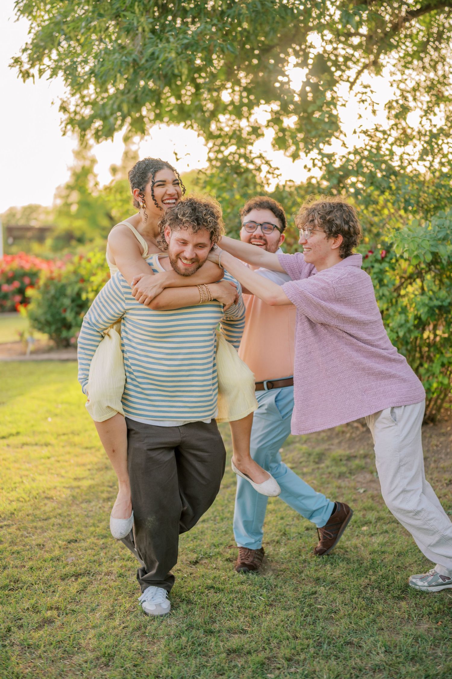 Gilbert Arizona family photographer capturing moments in rose garden setting