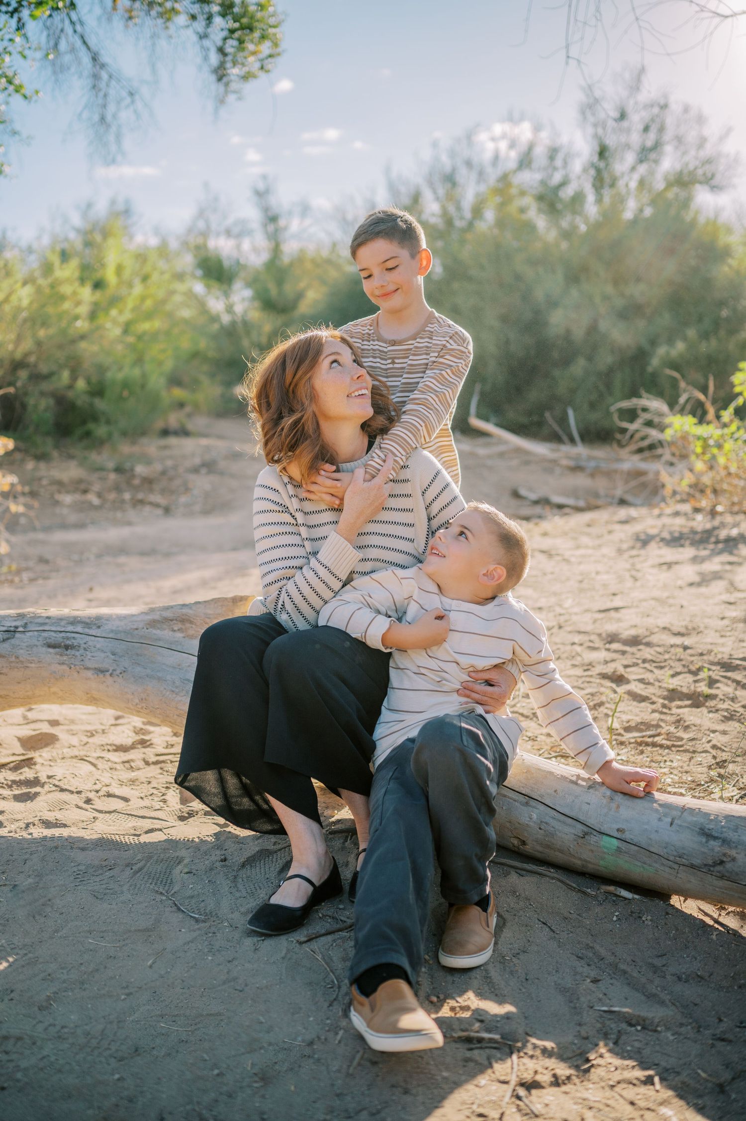Luxury Gilbert Arizona family photography surrounded by lush greenery. A relaxed, stress-free experience that captures real connection.