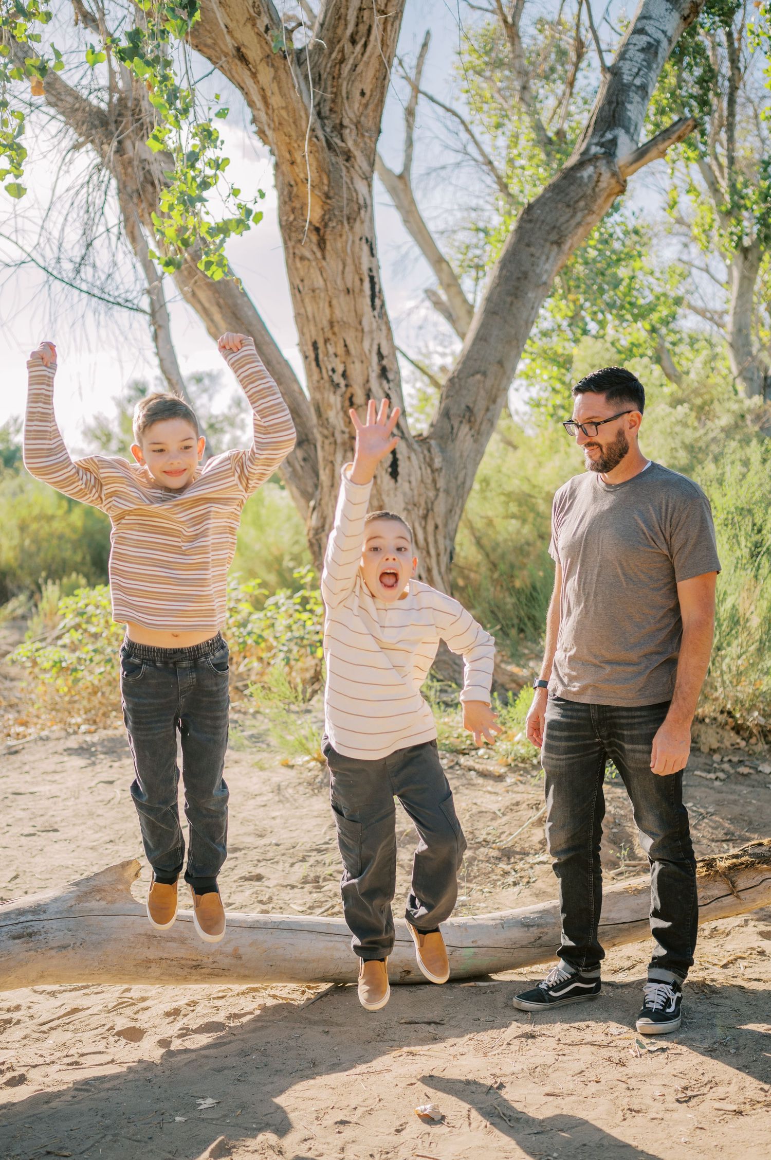 Luxury Gilbert Arizona family photography surrounded by lush greenery. A relaxed, stress-free experience that captures real connection.