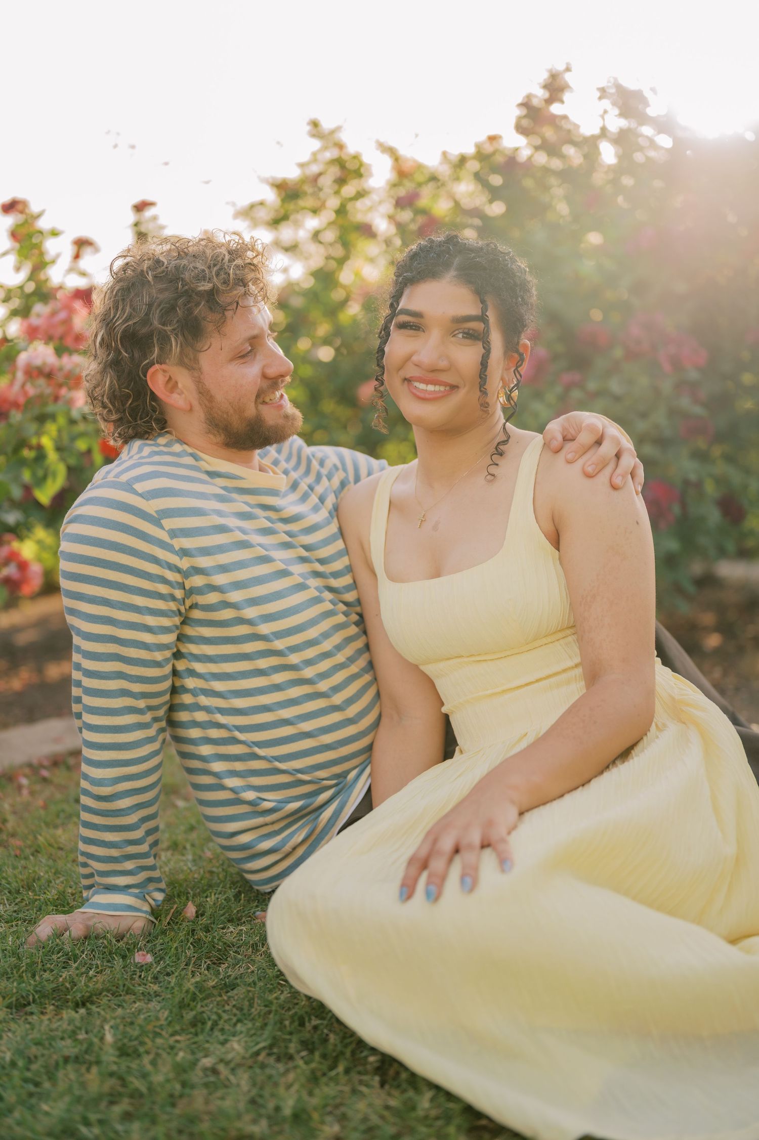 Romantic couple portrait in rose garden with soft natural light - Phoenix couples photographer