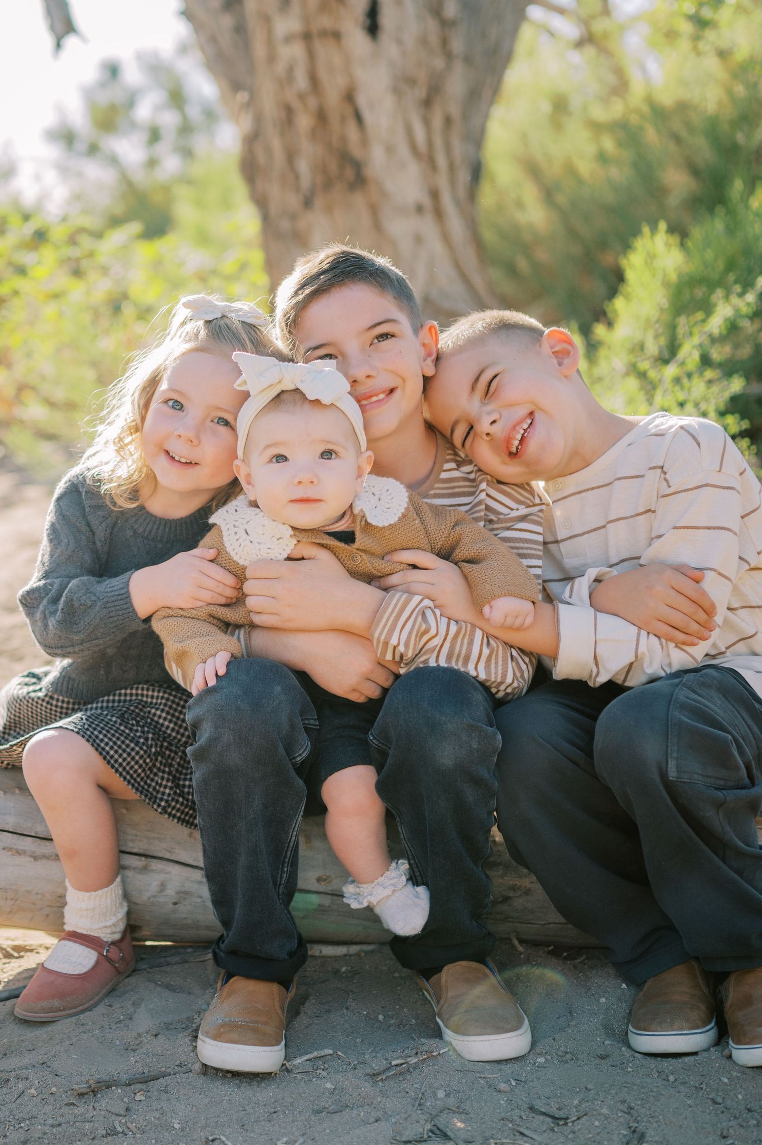 Luxury Gilbert Arizona family photography surrounded by lush greenery. A relaxed, stress-free experience that captures real connection.