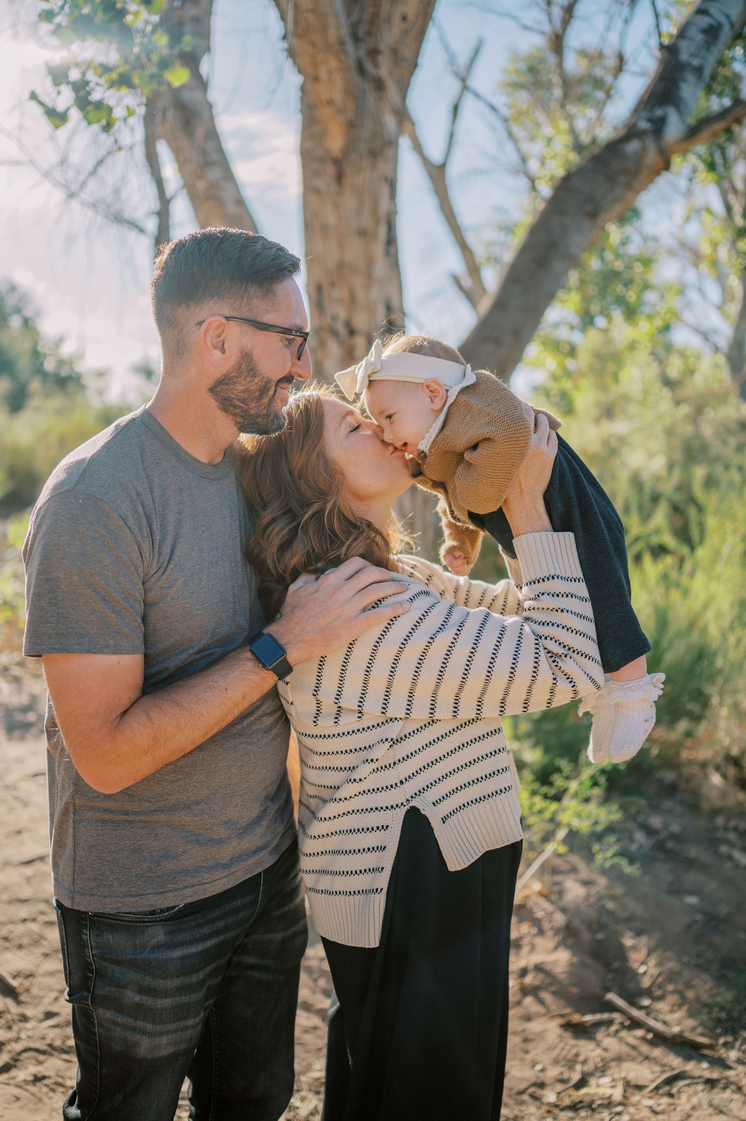 Luxury Gilbert Arizona family photography surrounded by lush greenery. A relaxed, stress-free experience that captures real connection.