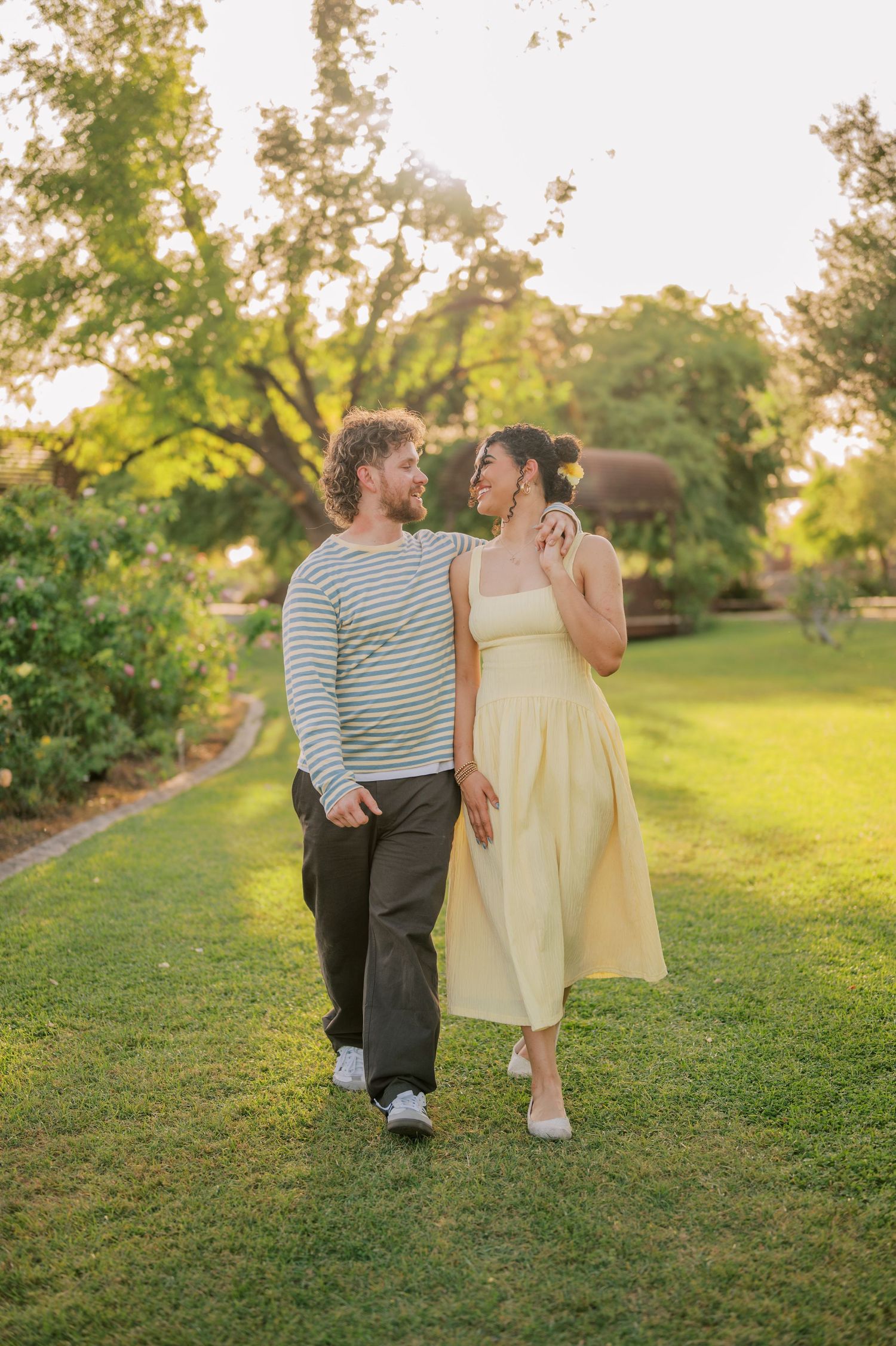 Romantic couple portrait in rose garden with soft natural light - Gilbert Arizona couples photographer