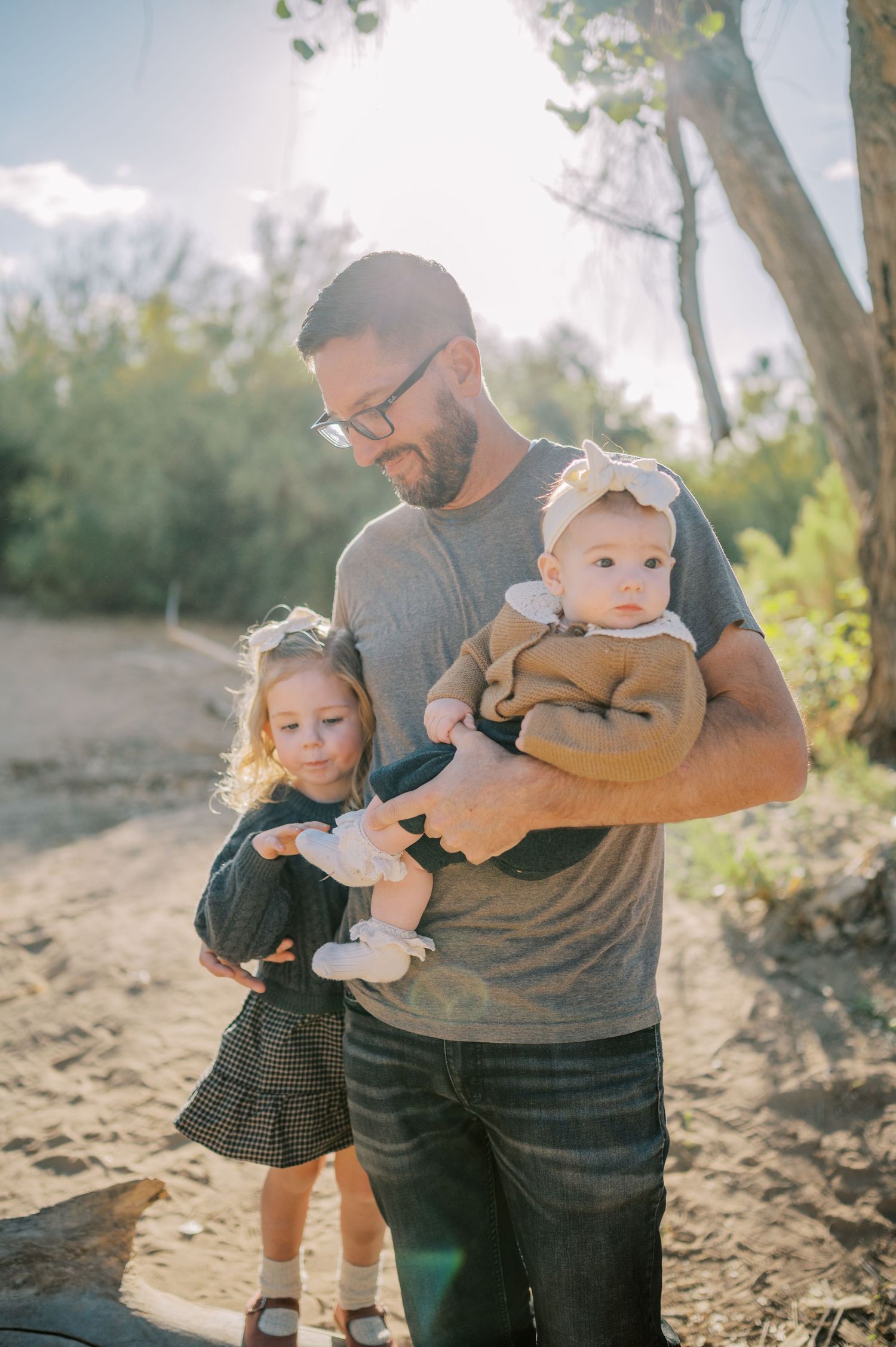 Luxury Gilbert Arizona family photography surrounded by lush greenery. A relaxed, stress-free experience that captures real connection.