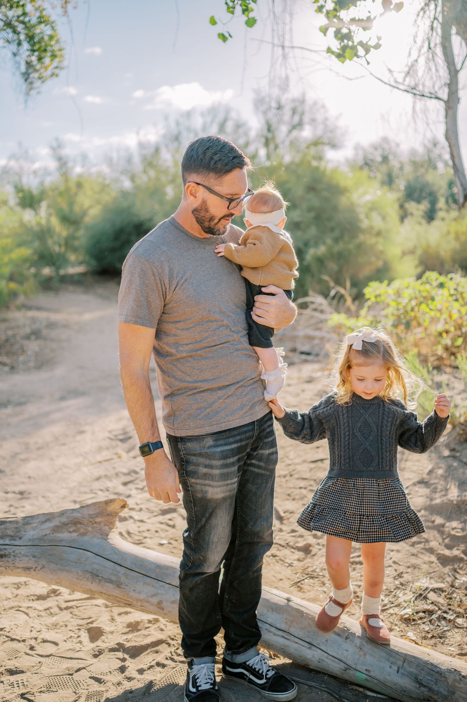 Luxury Gilbert Arizona family photography surrounded by lush greenery. A relaxed, stress-free experience that captures real connection.